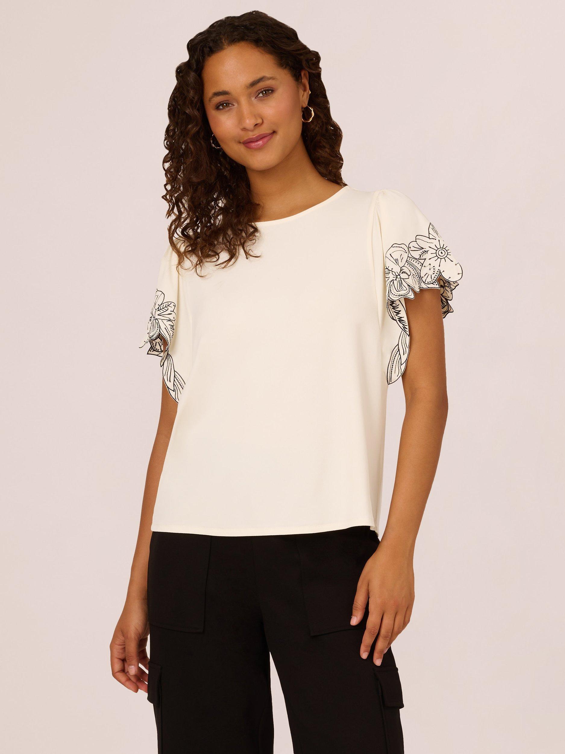 Product image 1 of 7, which shows Adrianna Papell Floral Embroidered Sleeve Top, Cream/Black, XS