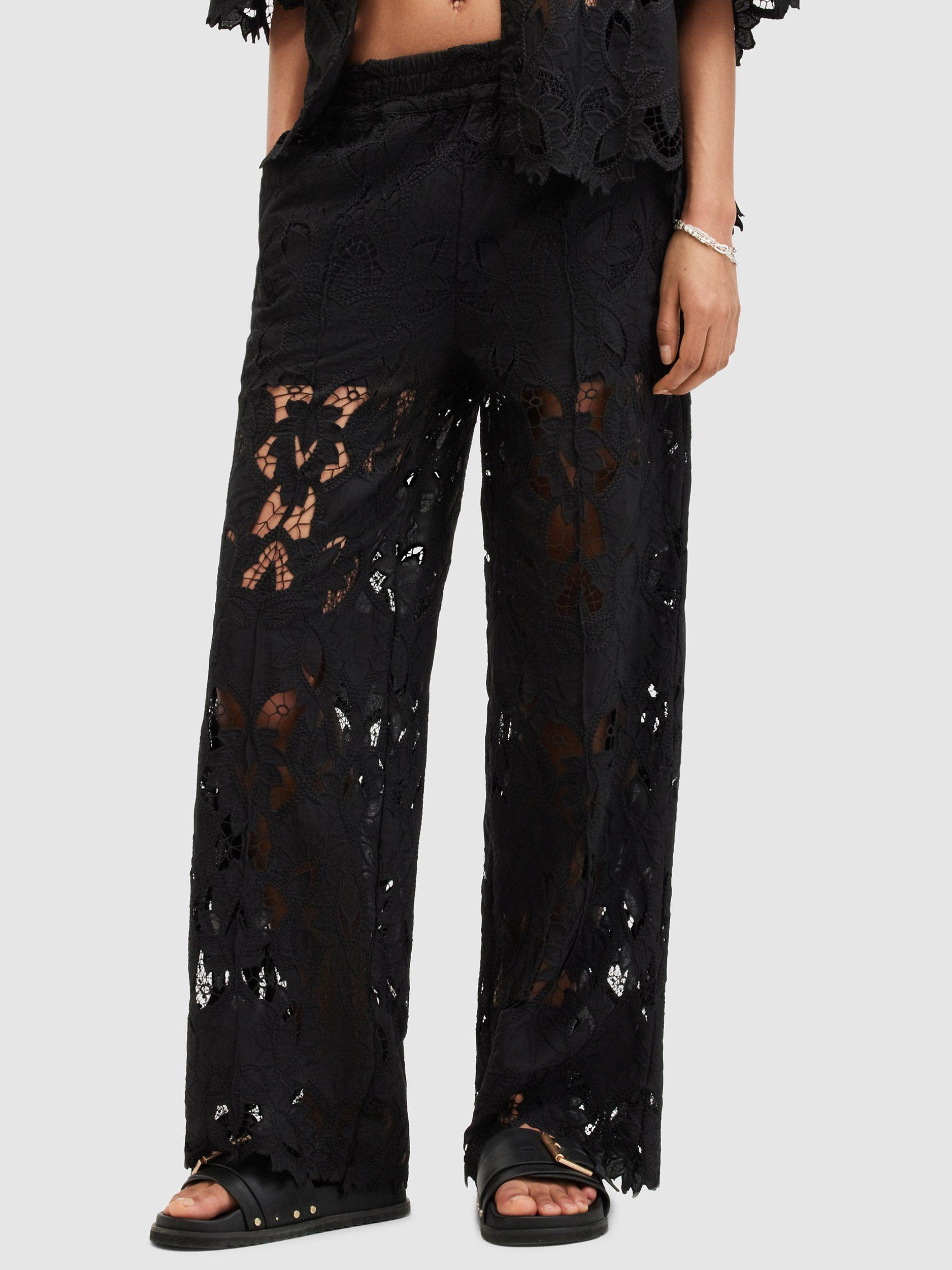 Product image 1 of 6, which shows AllSaints Charli Wide Leg Lace Trousers, Black, 10