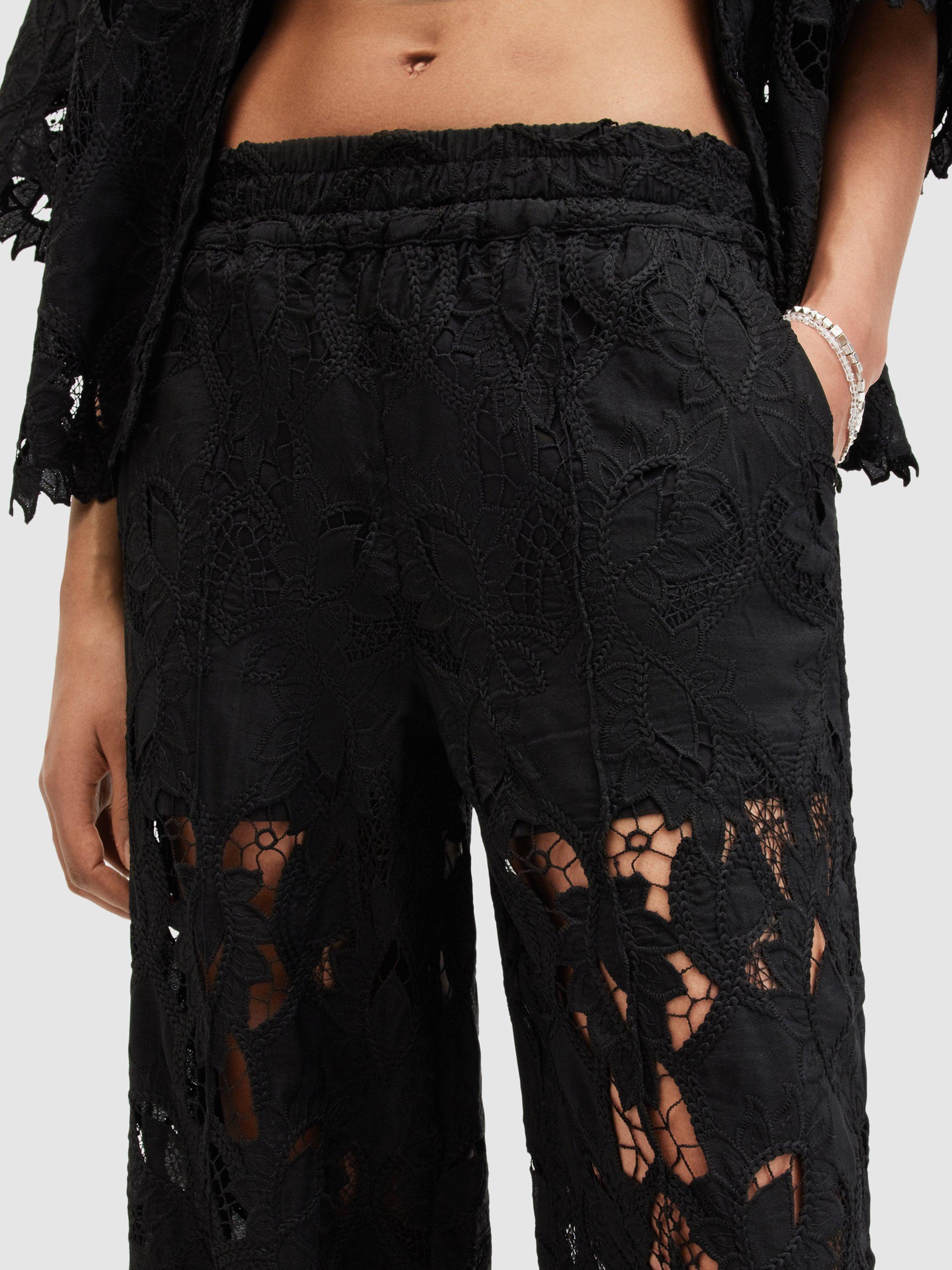 Product image 5 of 6, which shows AllSaints Charli Wide Leg Lace Trousers, Black, 10