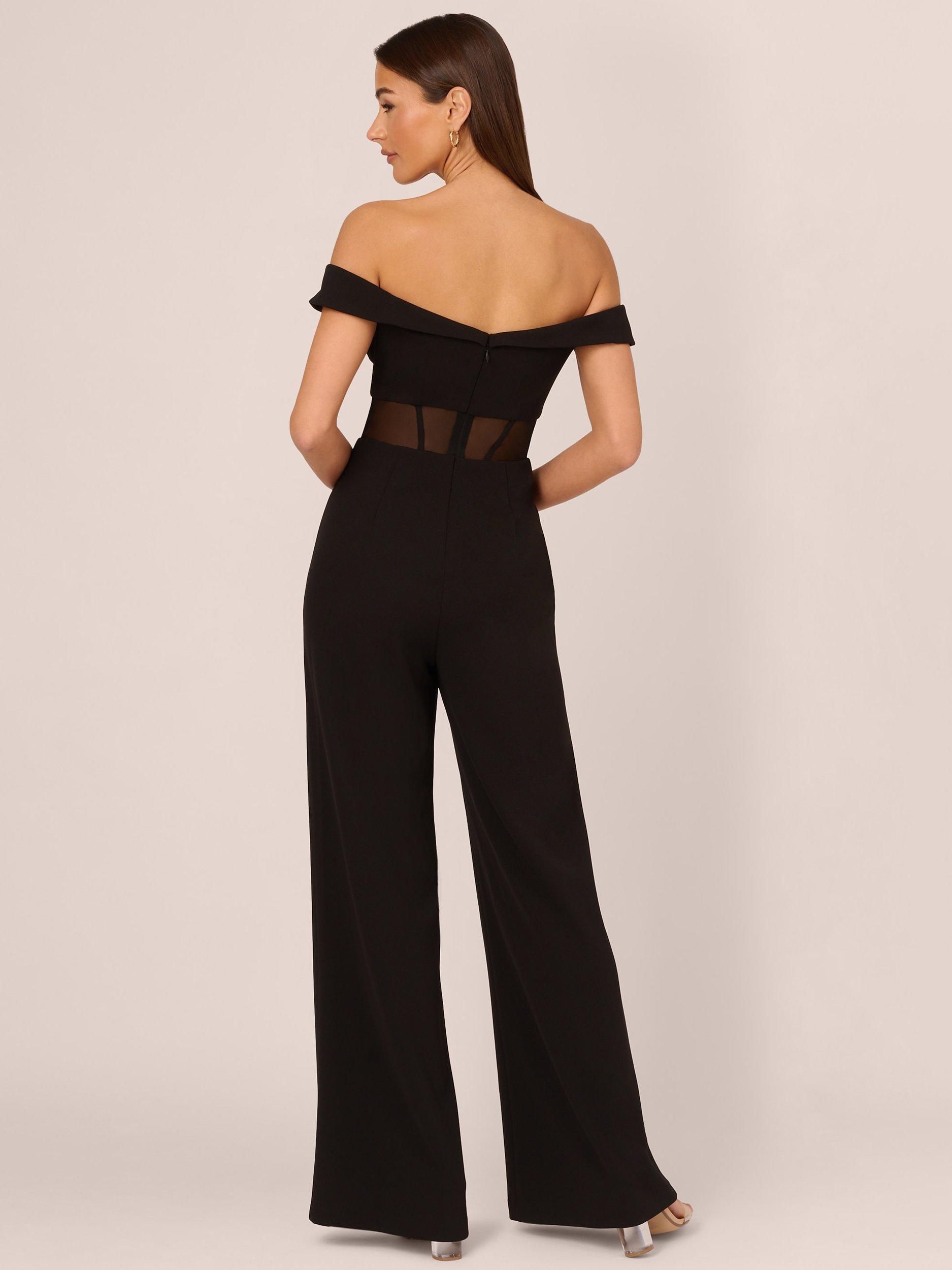 Overlay embellished split neck black jumpsuit on sale