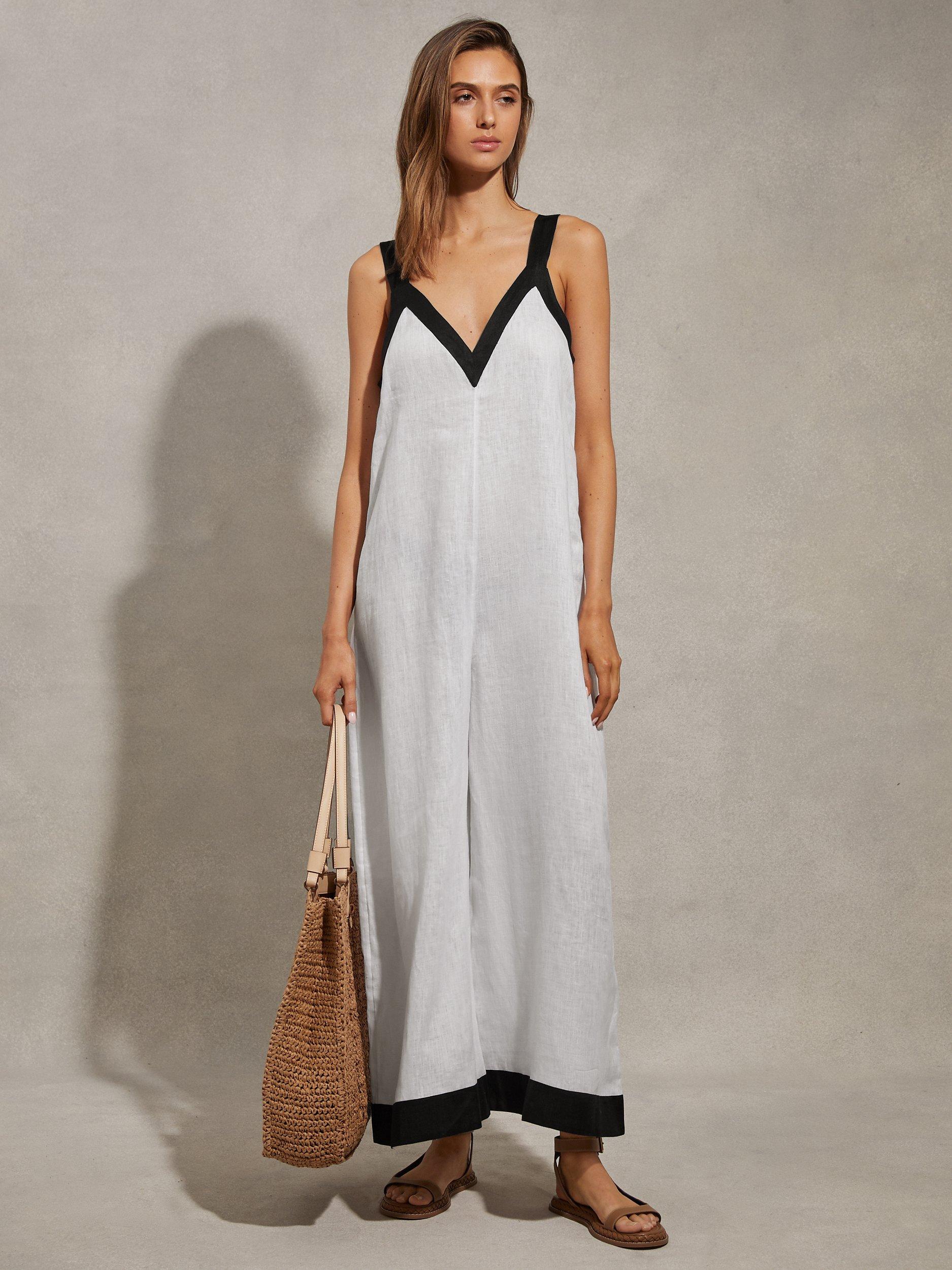 Product image 1 of 5, which shows Reiss Aida Wide Leg Linen Jumpsuit, White/Navy, 6