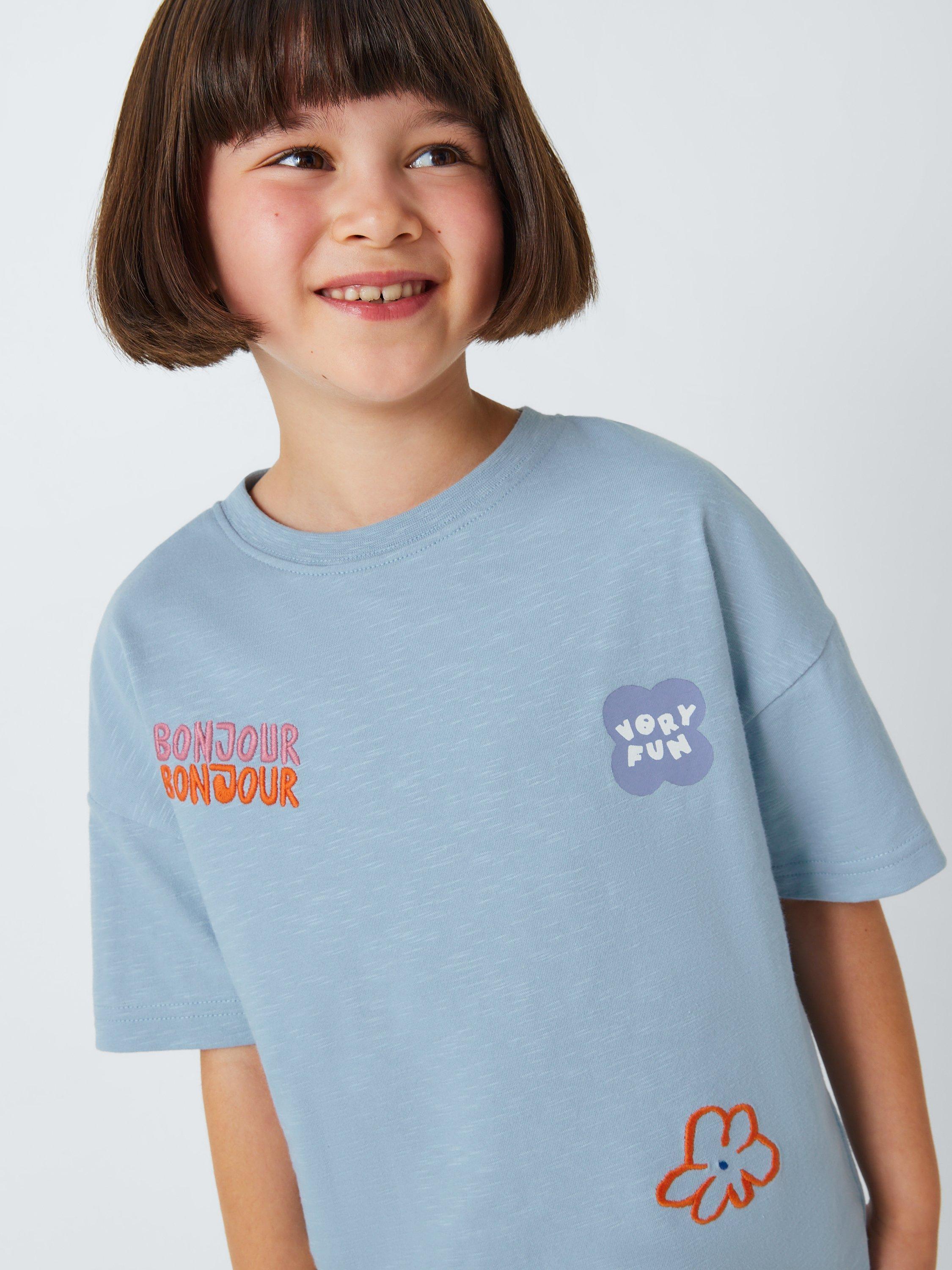 Product image 5 of 7, which shows John Lewis ANYDAY Kids' Badge T-Shirt, Light Blue, 5 years