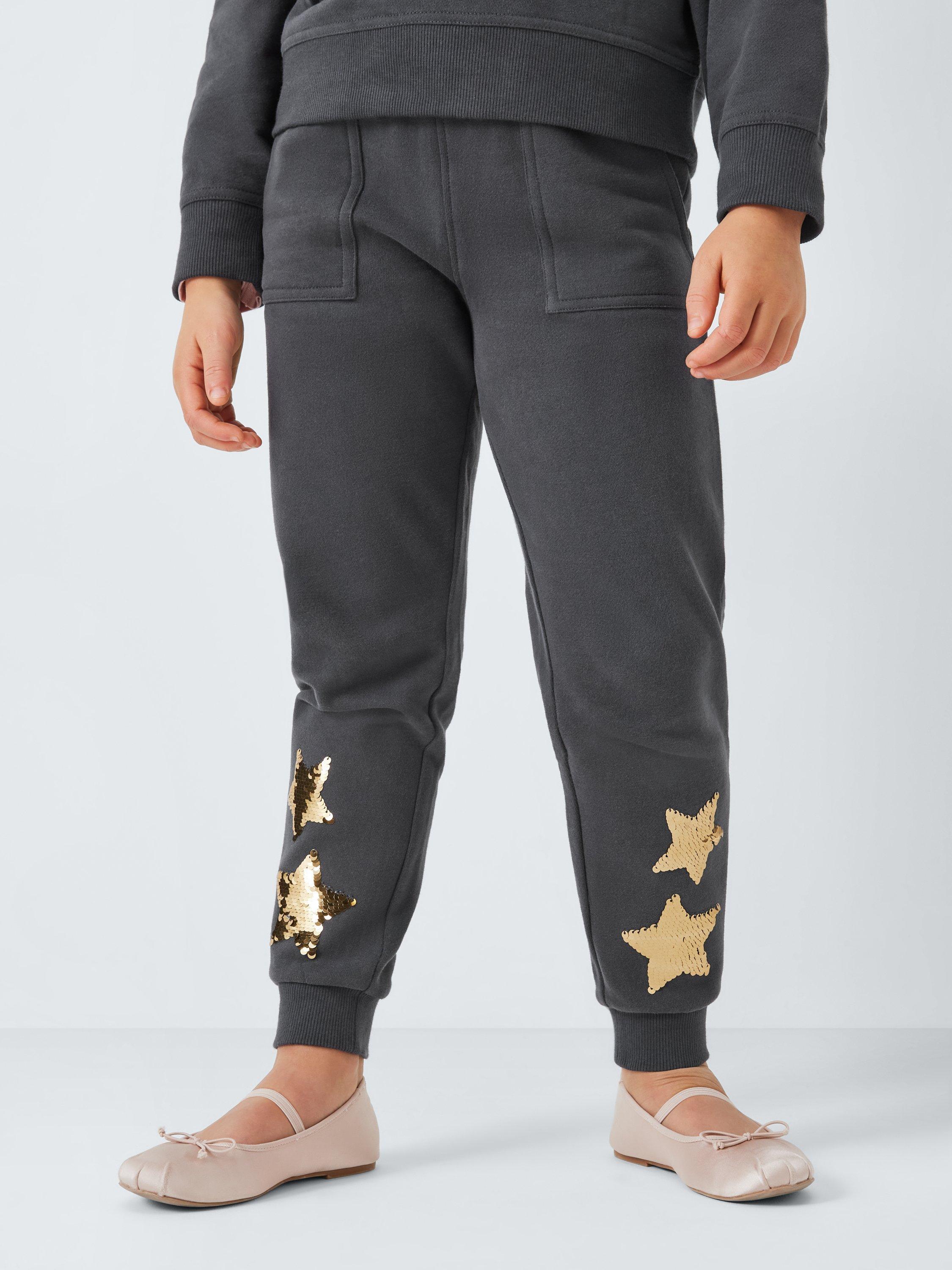 Product image 1 of 7, which shows John Lewis Kids' Sequin Stars Joggers, Black, 4 years
