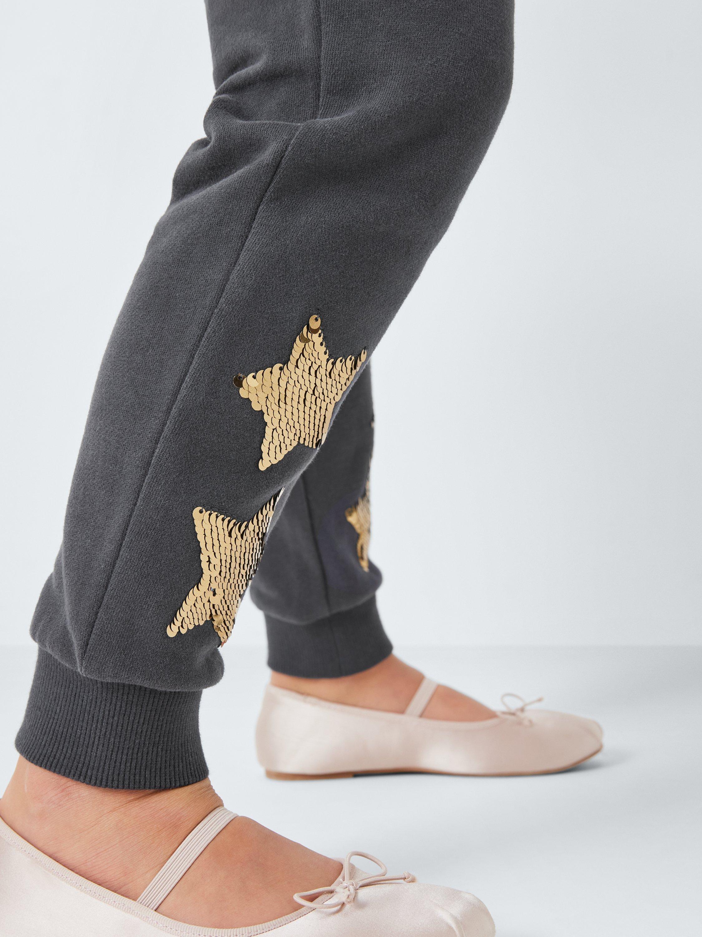 Product image 6 of 7, which shows John Lewis Kids' Sequin Stars Joggers, Black, 4 years