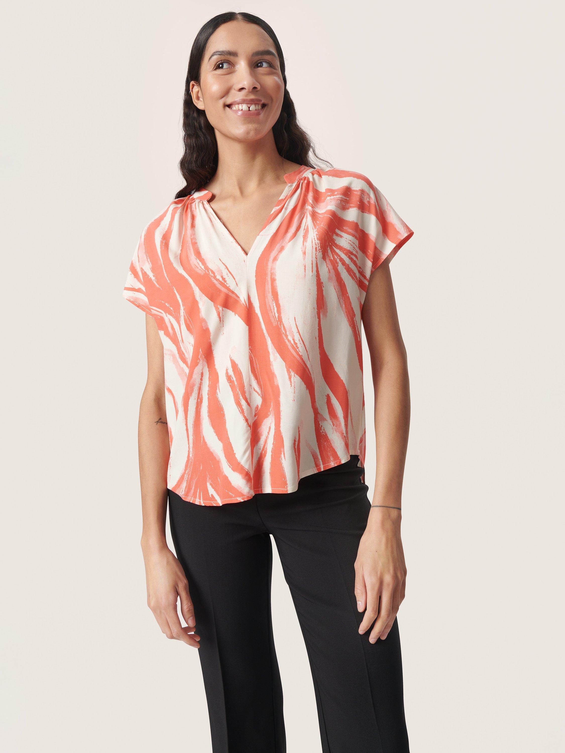 Product image 1 of 5, which shows Soaked In Luxury Wynter Notch Neck Short Sleeve Blouse, Hot Coral Wave, L