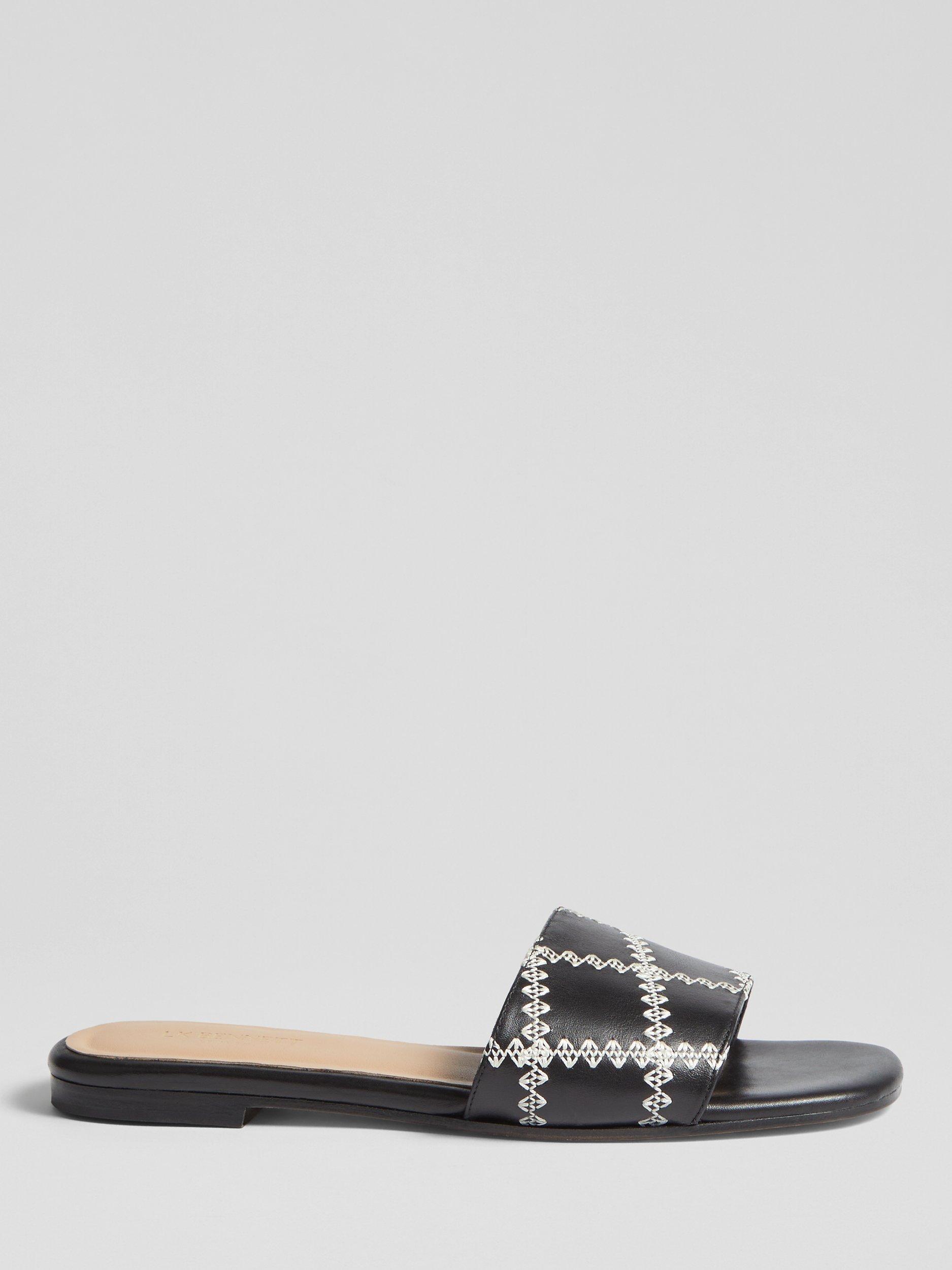 Product image 1 of 4, which shows L.K.Bennett Hema Stitch Detail Leather Slider Sandals, Black, 4