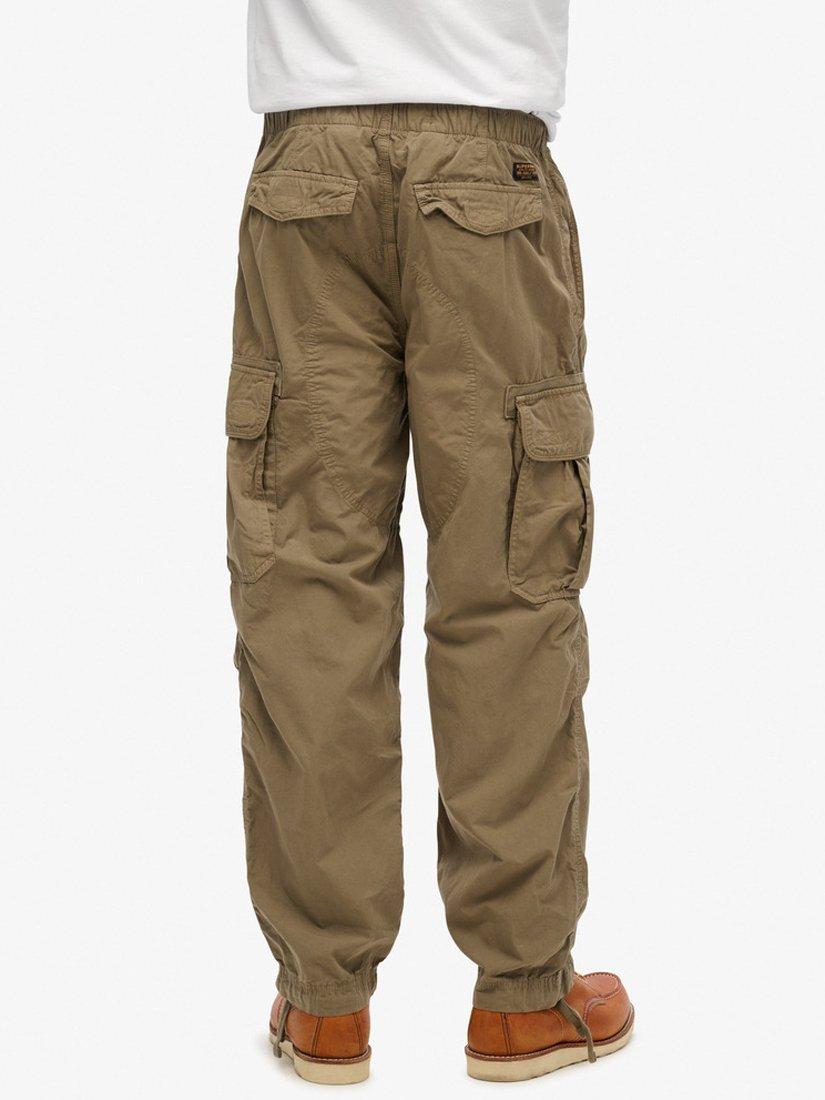 Product image 6 of 7, which shows Superdry Baggy Parachute Pants, Fort Taupe, W28/L32