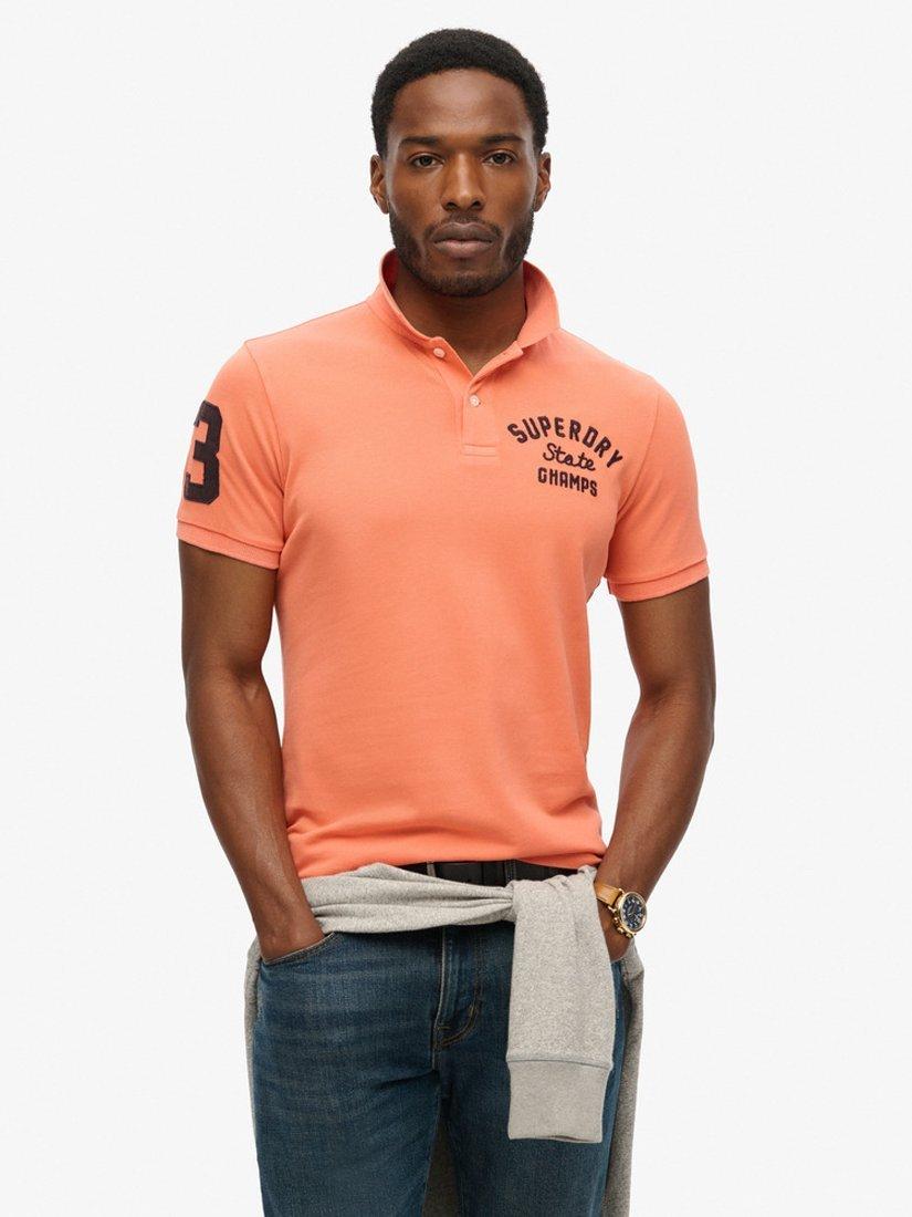 Product image 1 of 6, which shows Superdry Superstate Polo Shirt, Sunburst Coral, S