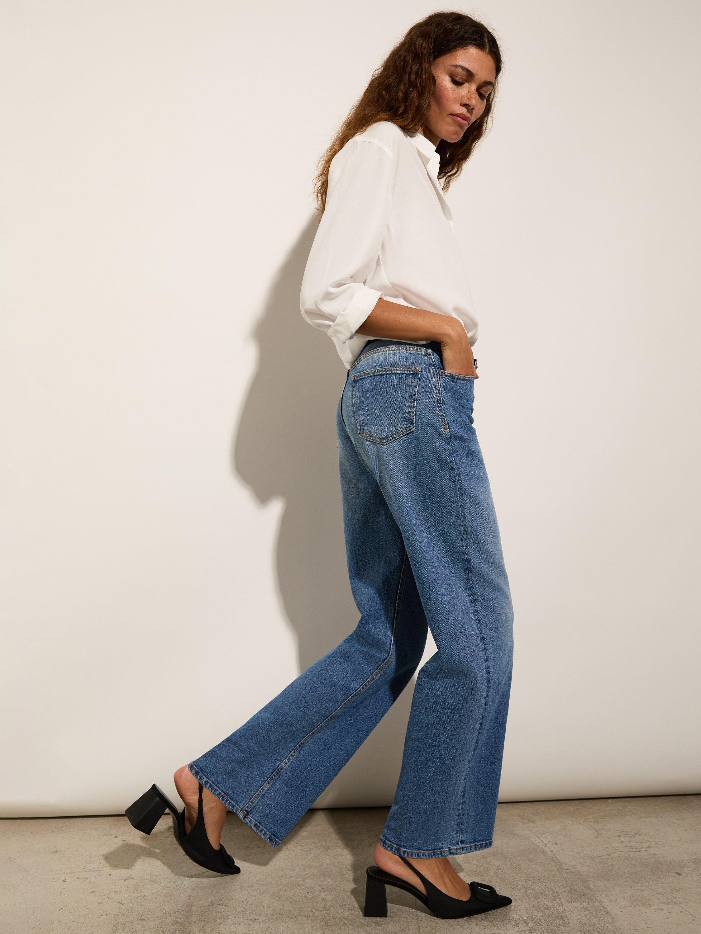 Product image 1 of 7, which shows Baukjen Slouch Jeans, Mid Indigo, 10