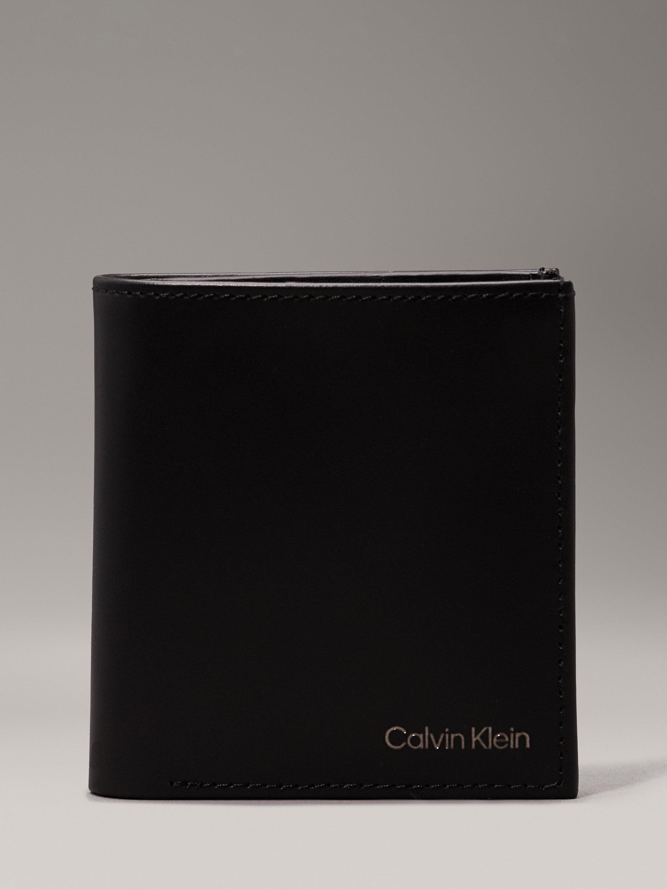 Product image 1 of 5, which shows Calvin Klein Smooth Leather Trifold Wallet, Ck Black
