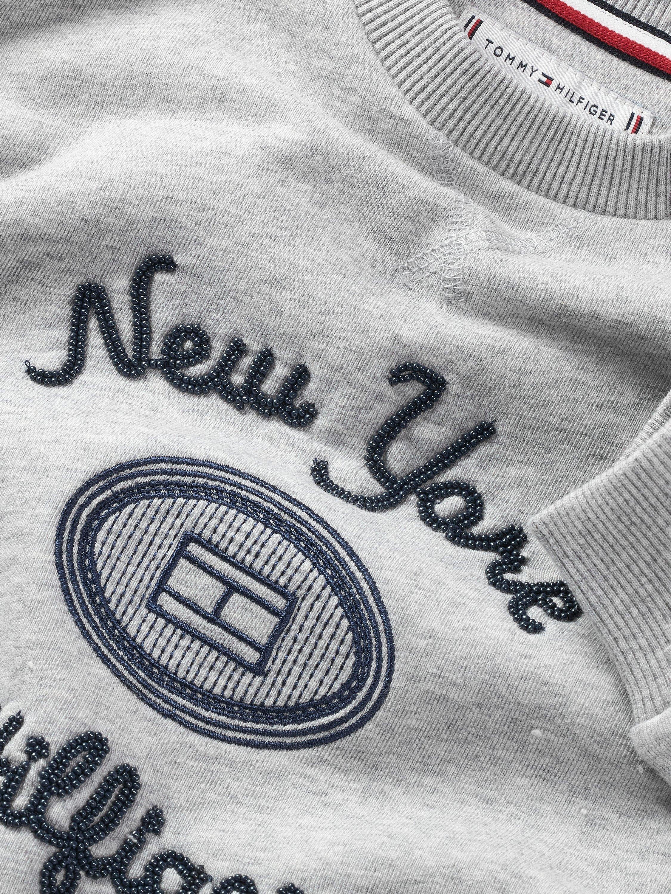 Product image 3 of 3, which shows Tommy Hilfiger Kids' New York Logo Crew Neck Sweatshirt, Light Grey Heather, 6 years