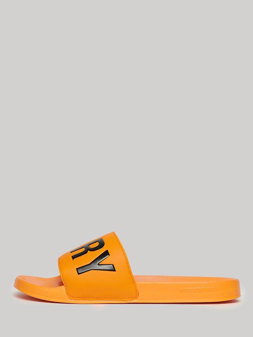 Product image 1 of 4, which shows Superdry Vegan Core Logo Pool Sliders, Bright Marigold/Black, 6-7
