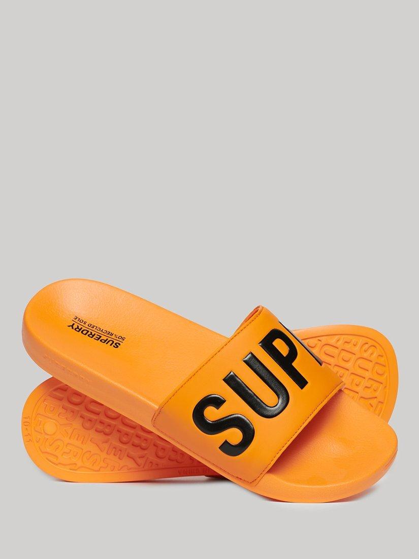 Product image 2 of 4, which shows Superdry Vegan Core Logo Pool Sliders, Bright Marigold/Black, 6-7