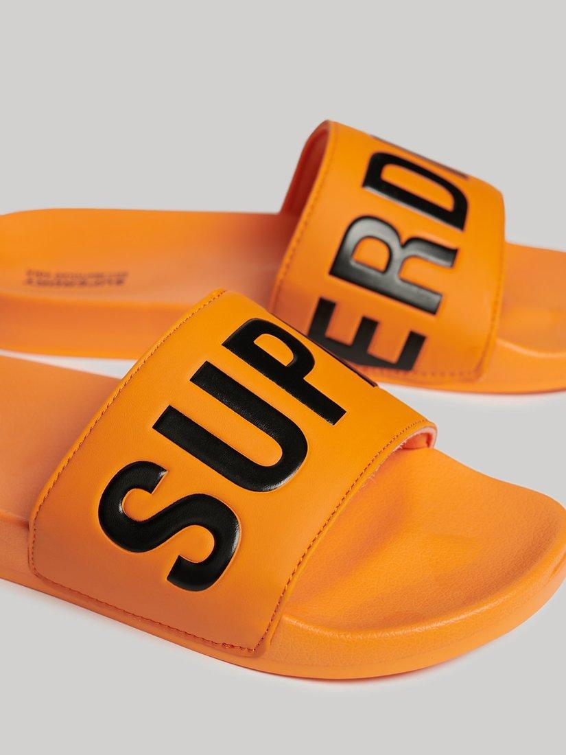 Product image 3 of 4, which shows Superdry Vegan Core Logo Pool Sliders, Bright Marigold/Black, 6-7