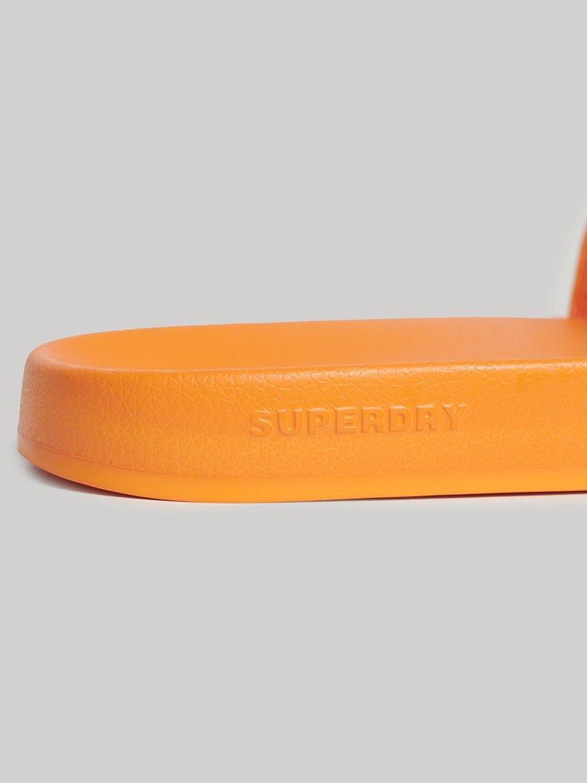 Product image 4 of 4, which shows Superdry Vegan Core Logo Pool Sliders, Bright Marigold/Black, 6-7