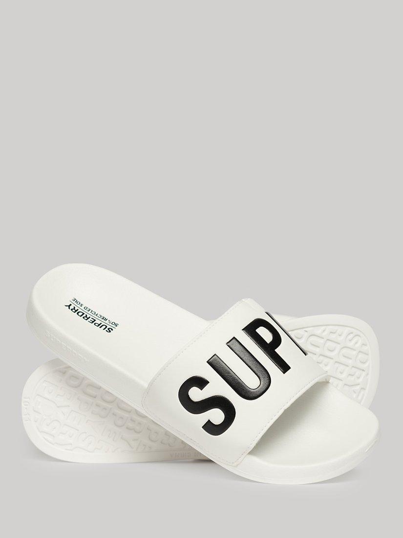 Product image 1 of 9, which shows Superdry Vegan Core Logo Pool Sliders, Optic/Black, 6-7