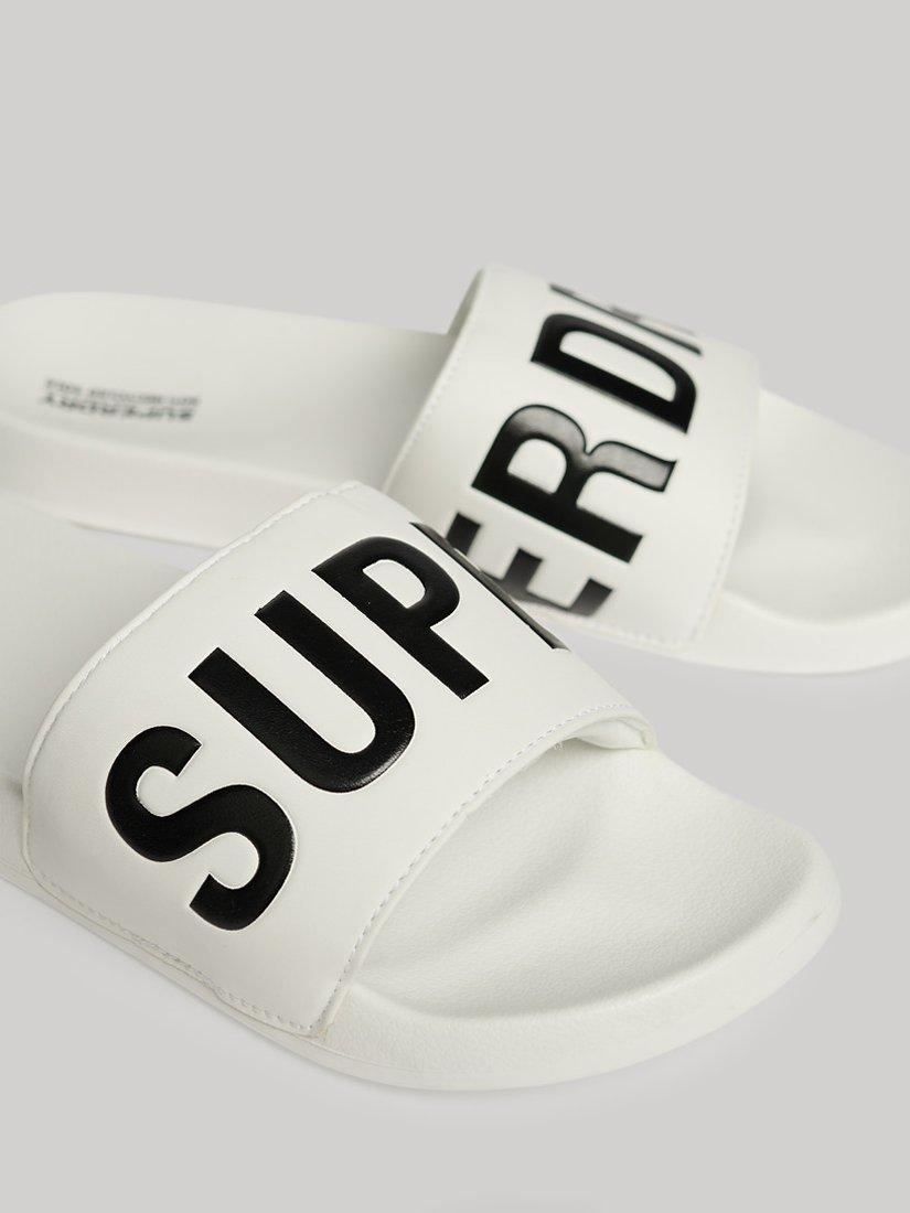 Product image 2 of 9, which shows Superdry Vegan Core Logo Pool Sliders, Optic/Black, 6-7