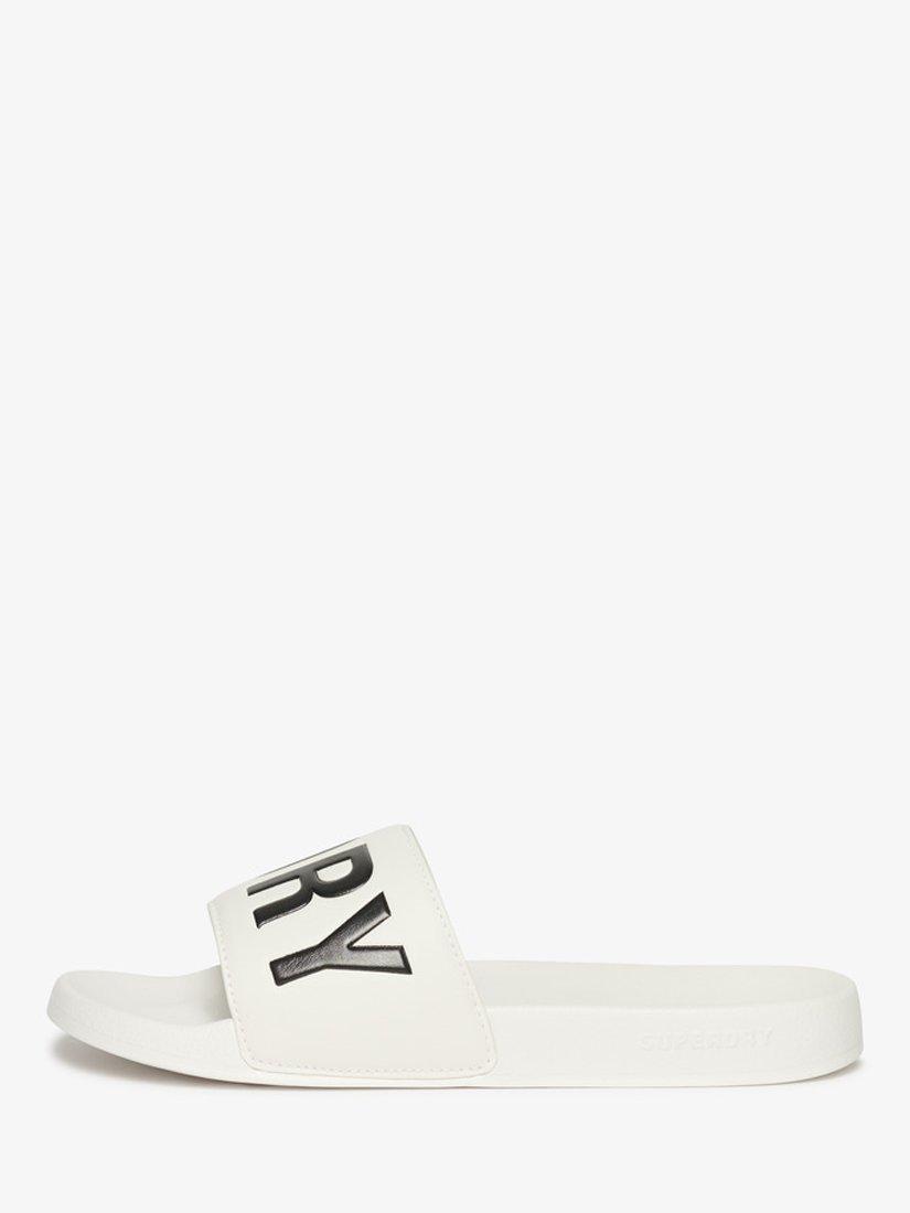Product image 6 of 9, which shows Superdry Vegan Core Logo Pool Sliders, Optic/Black, 6-7