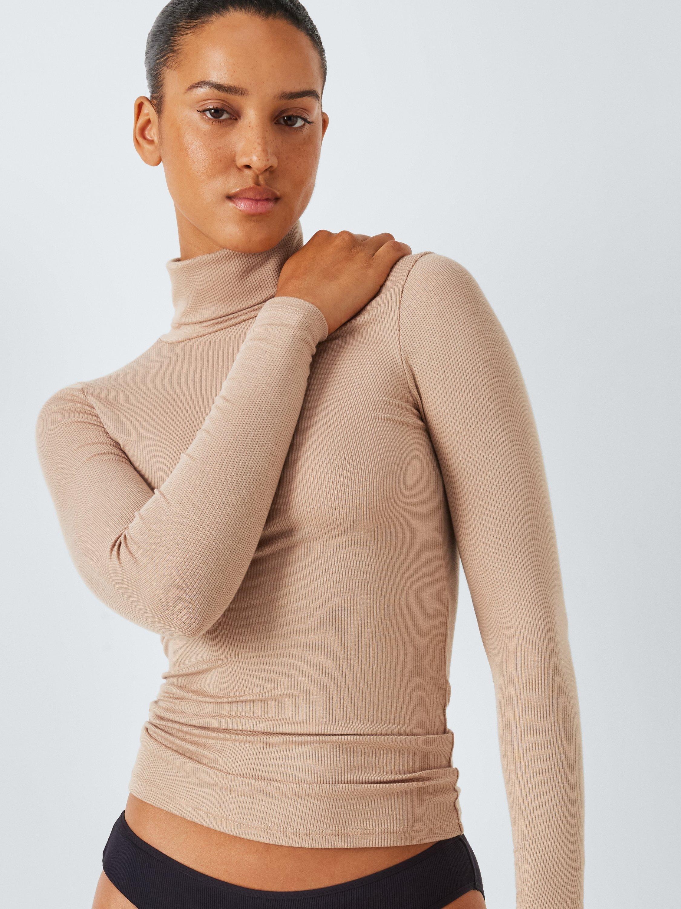 Product image 4 of 5, which shows John Lewis Heat Generating Ribbed Roll Neck Thermal Top, Natural, 12-14