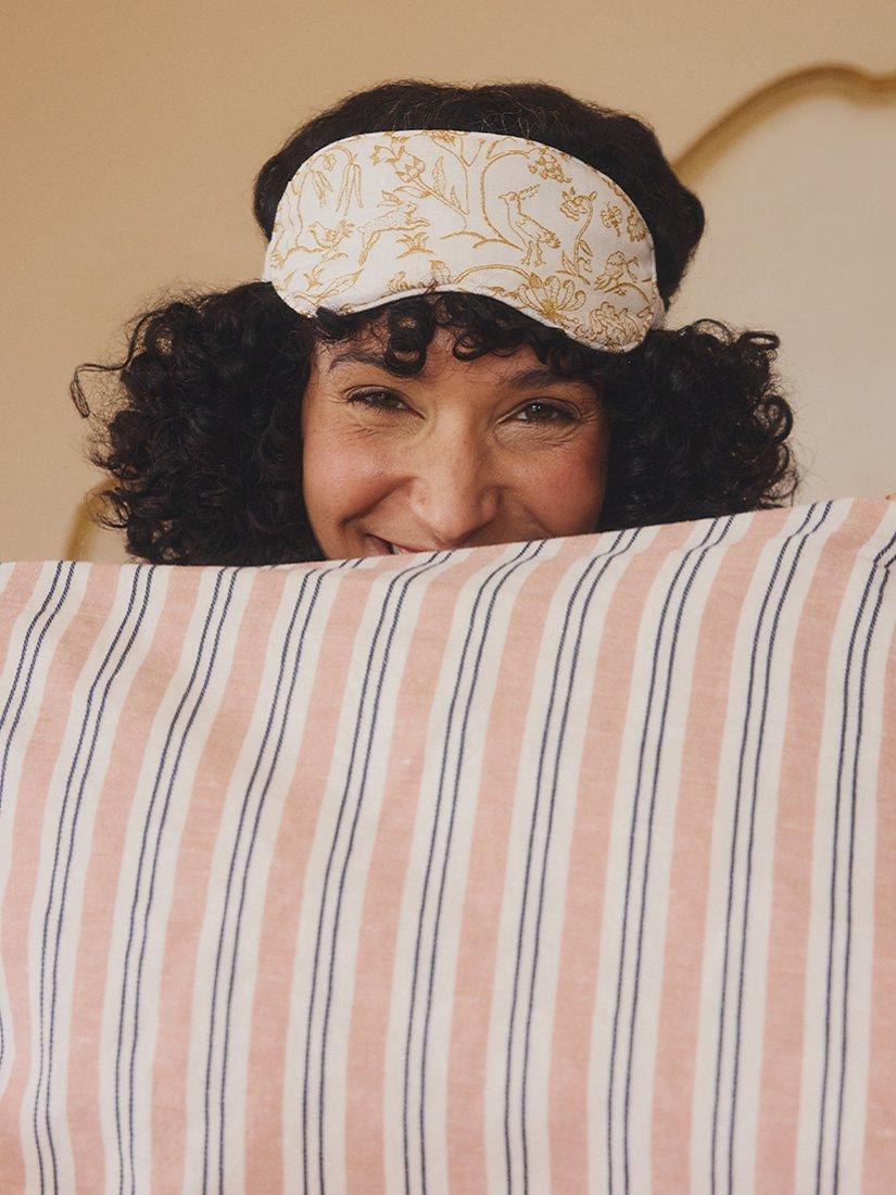 Product image 1 of 2, which shows Piglet in Bed Morris & Co. Ernest Linen Sleep Mask, White/Multi