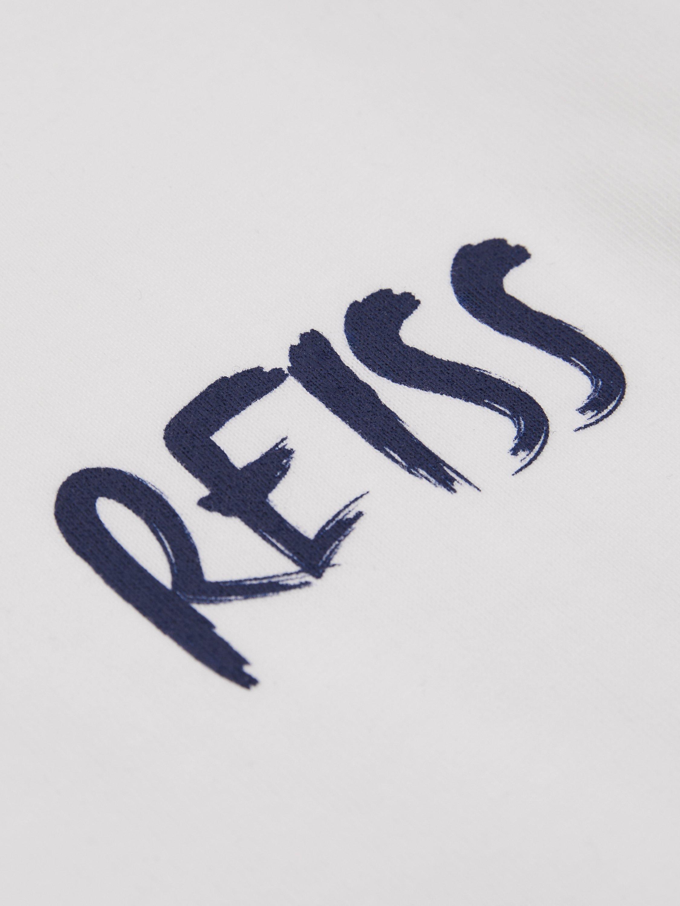 Product image 4 of 4, which shows Reiss Kids' Abbott Paintstroke Logo T-Shirt, Optic White, 13-14 years