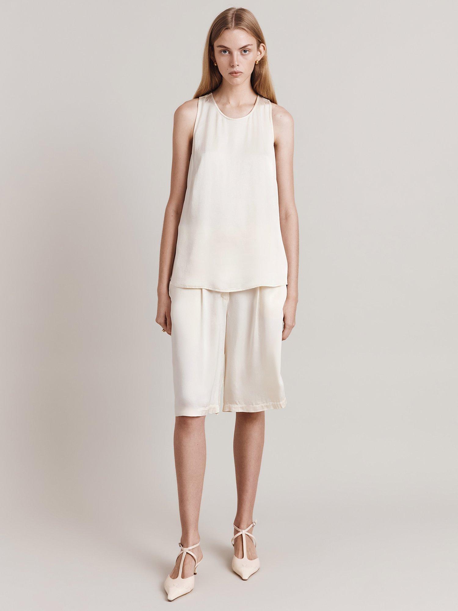 Product image 1 of 4, which shows Ghost Kate Sleeveless Satin Top, Ivory, XS