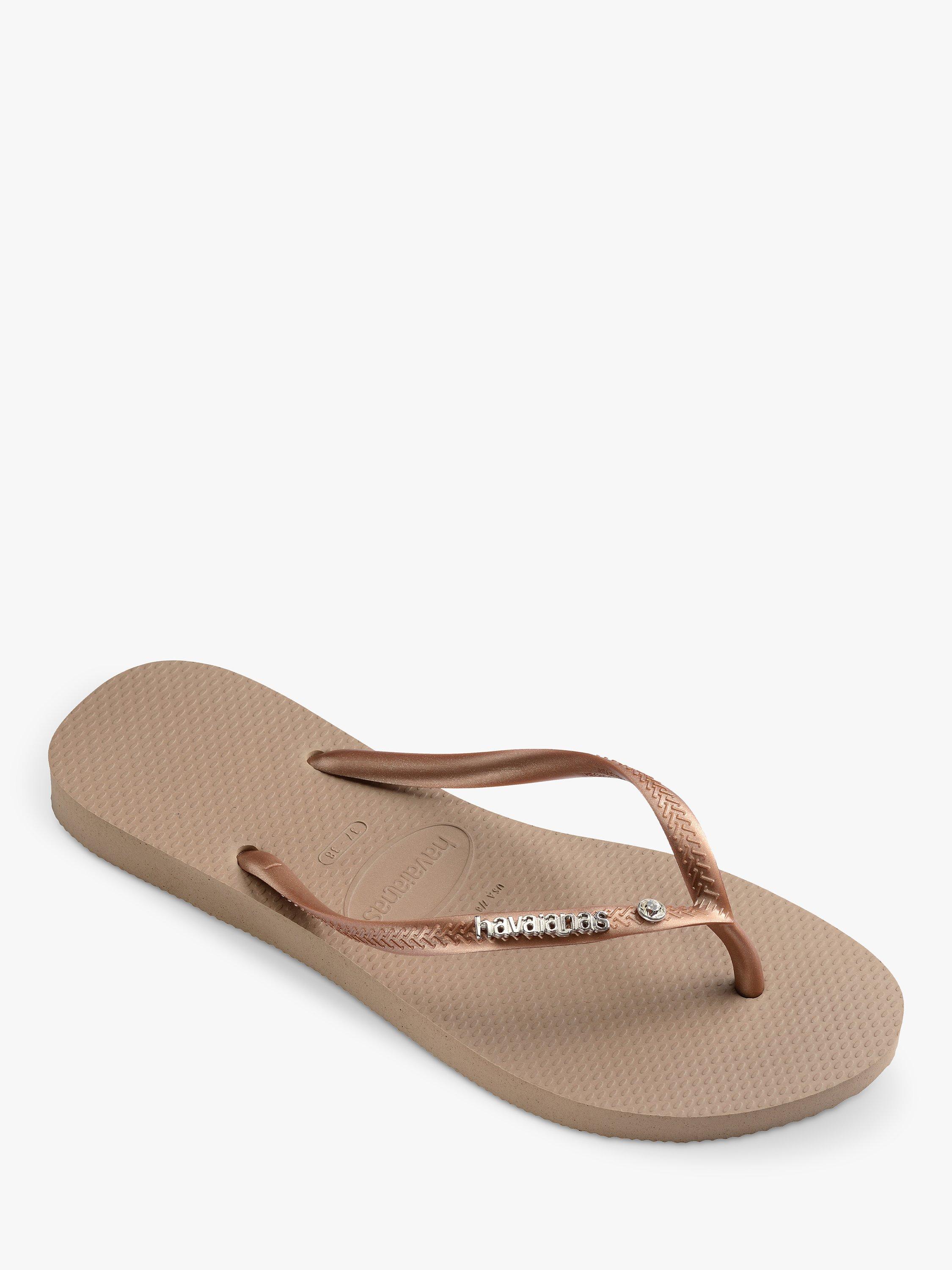 Product image 2 of 6, which shows Havaianas Slim Metallic Logo Flip Flops, Rose Gold/Silver, 3/4