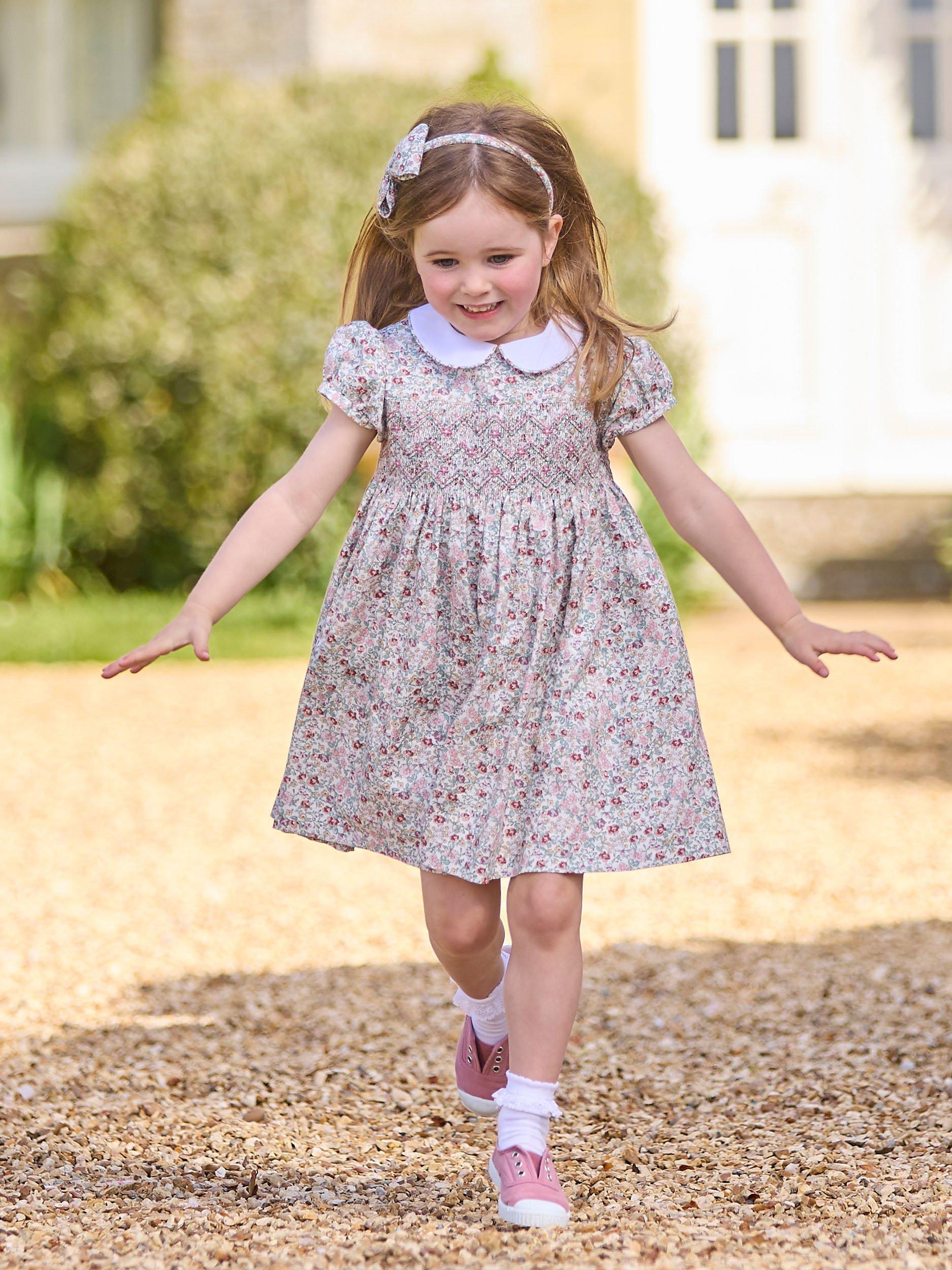 Product image 7 of 7, which shows Trotters Kids' Arabella Floral Smocked Dress, Pink/Multi, 2 years