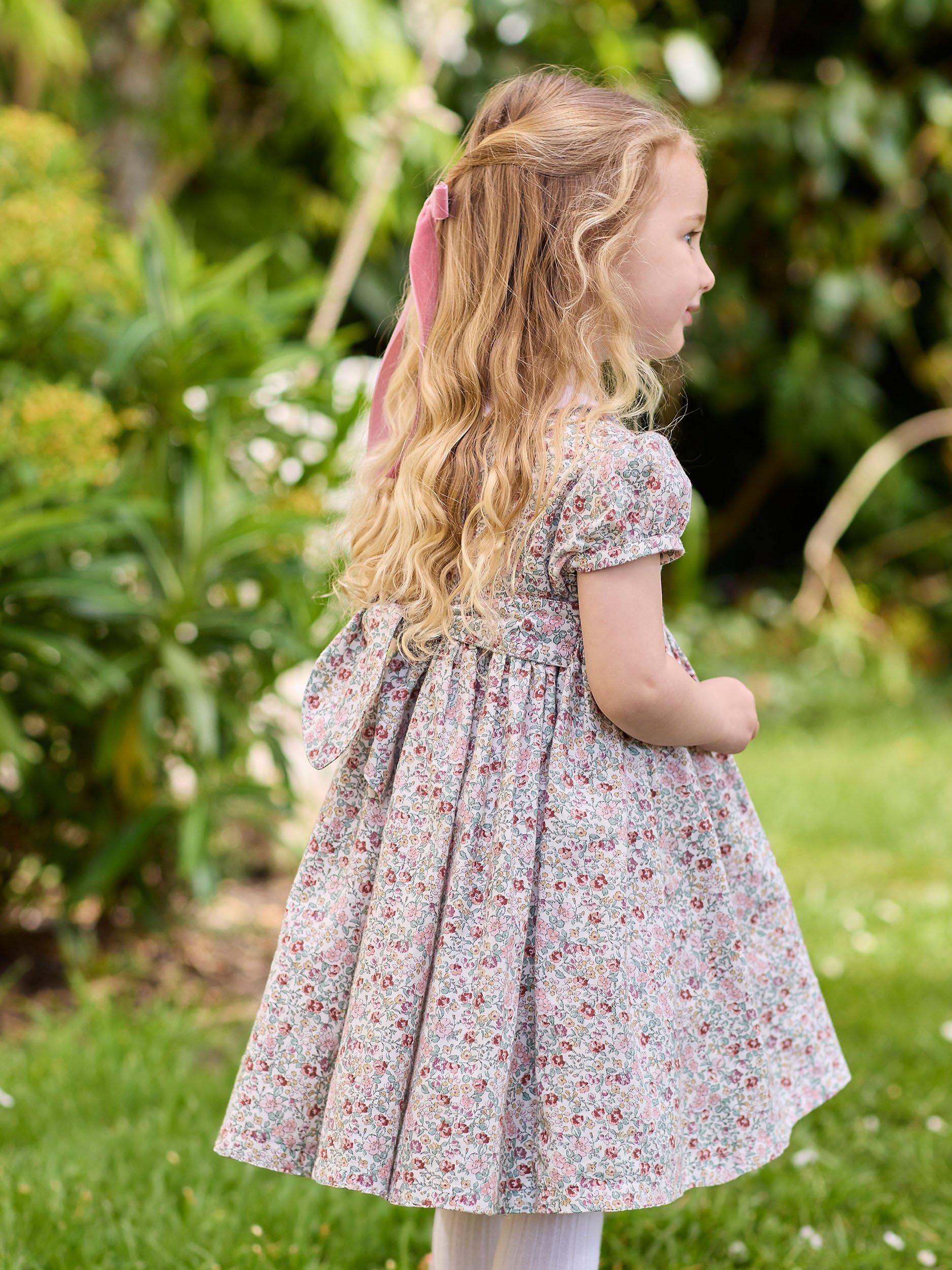 Product image 4 of 7, which shows Trotters Kids' Arabella Floral Smocked Dress, Pink/Multi, 2 years