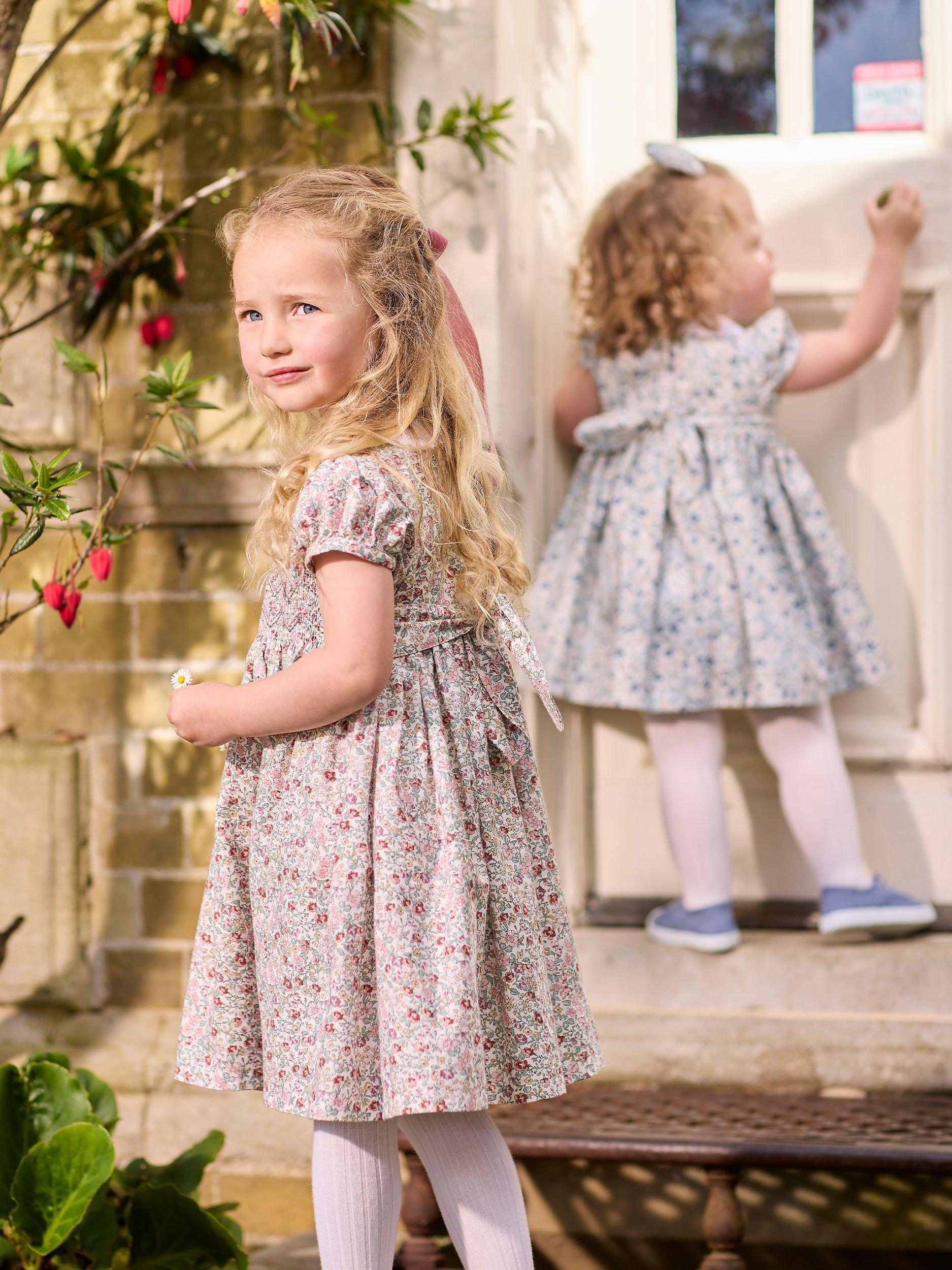 Product image 5 of 7, which shows Trotters Kids' Arabella Floral Smocked Dress, Pink/Multi, 2 years