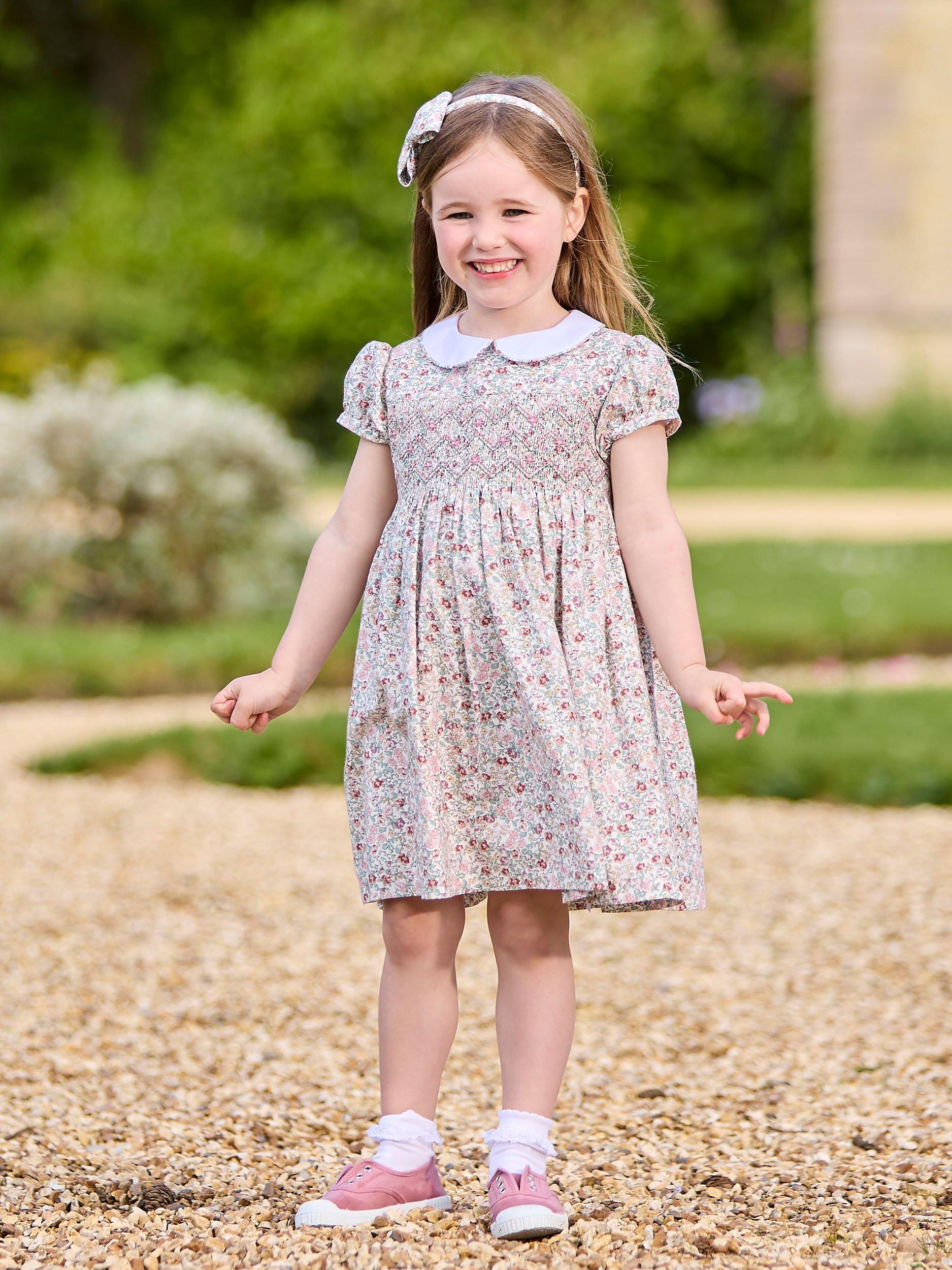 Product image 6 of 7, which shows Trotters Kids' Arabella Floral Smocked Dress, Pink/Multi, 2 years