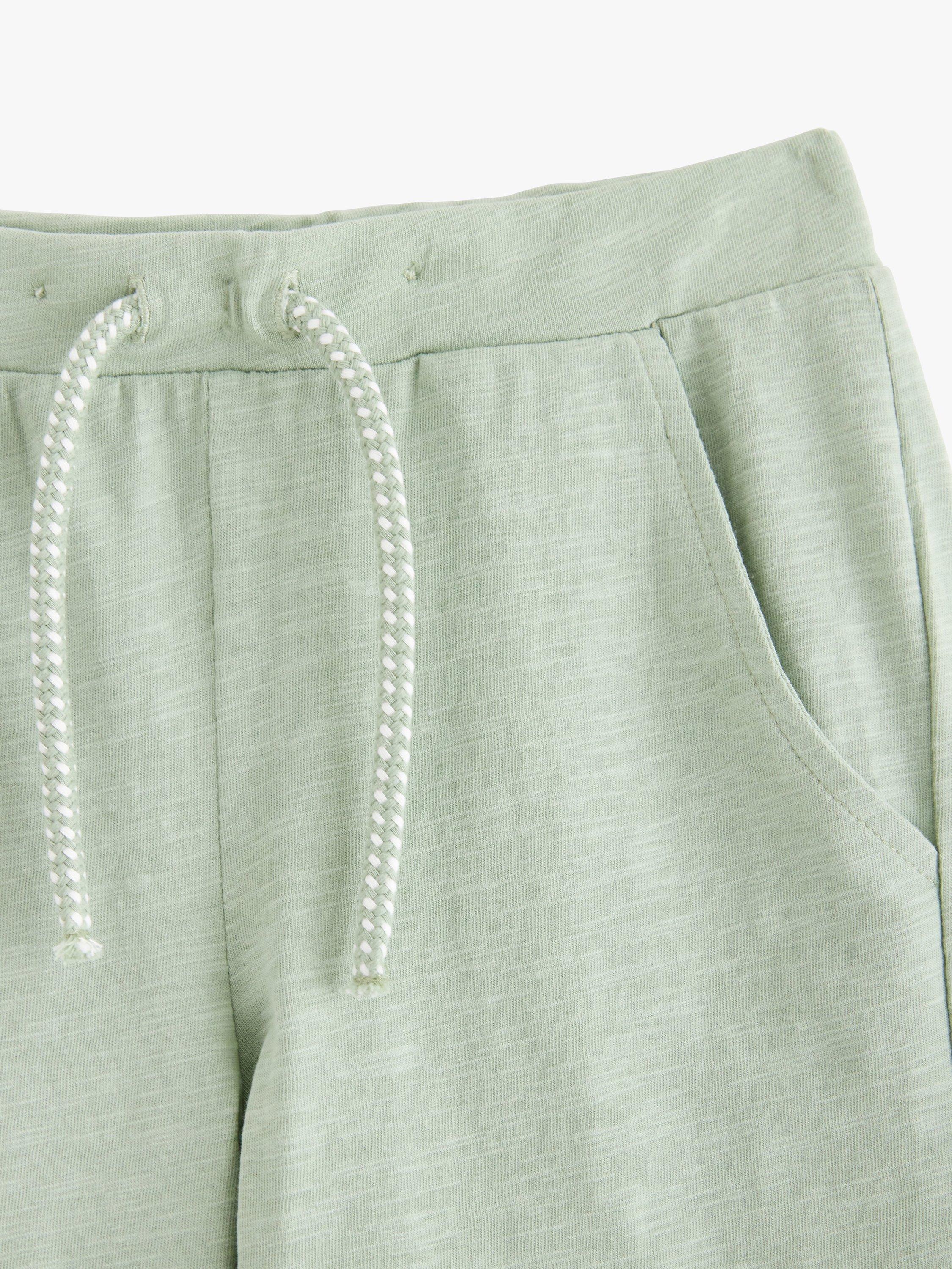 Product image 6 of 6, which shows Lindex Kids' Organic Cotton Lightweight Drawstring Shorts, Light Dusty Green, 18-24 months