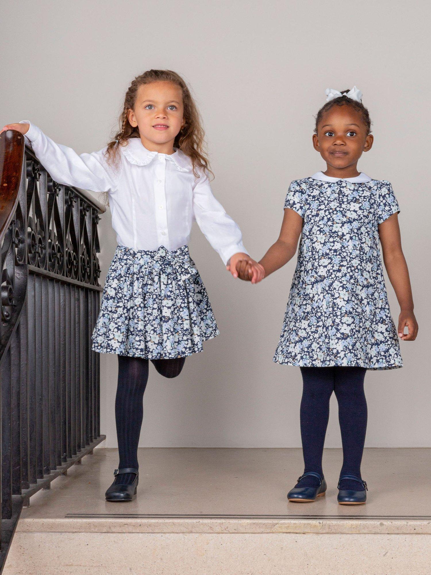 Product image 4 of 5, which shows Trotters Kids' Annie Floral Print Cord Skirt, Navy/Multi, 2-3 years
