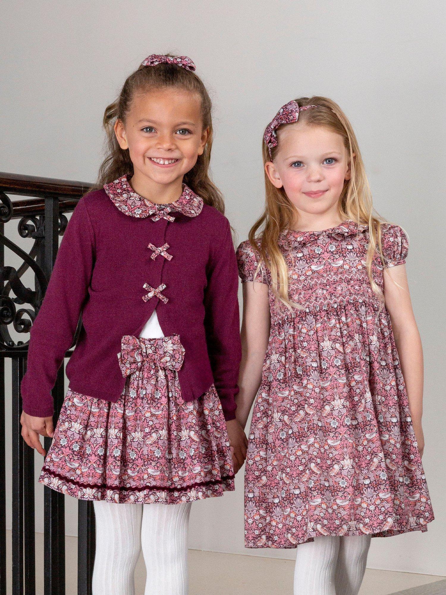 Product image 4 of 5, which shows Trotters Kids' Strawberry Thief Ric Rac Skirt, Plumstrawberry, 2-3 years