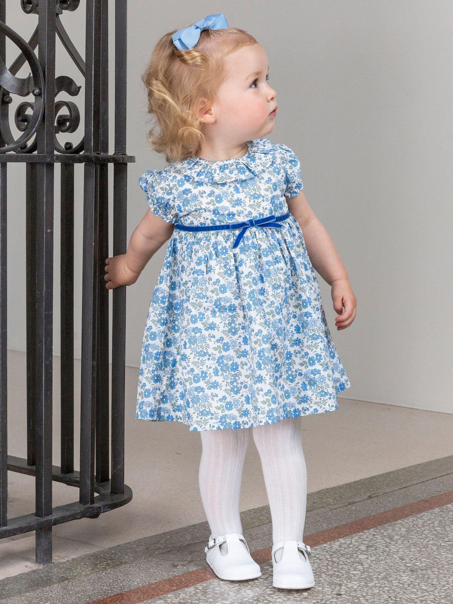 Product image 4 of 5, which shows Trotters Baby Floret Willow Dress, Blue/Multi, 3-6 months