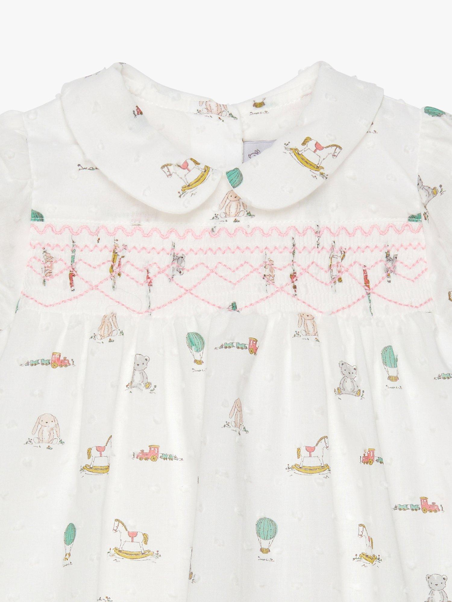 Product image 3 of 5, which shows Trotters Baby Bunny and Friends Smocked Dress, White/Multi, Newborn