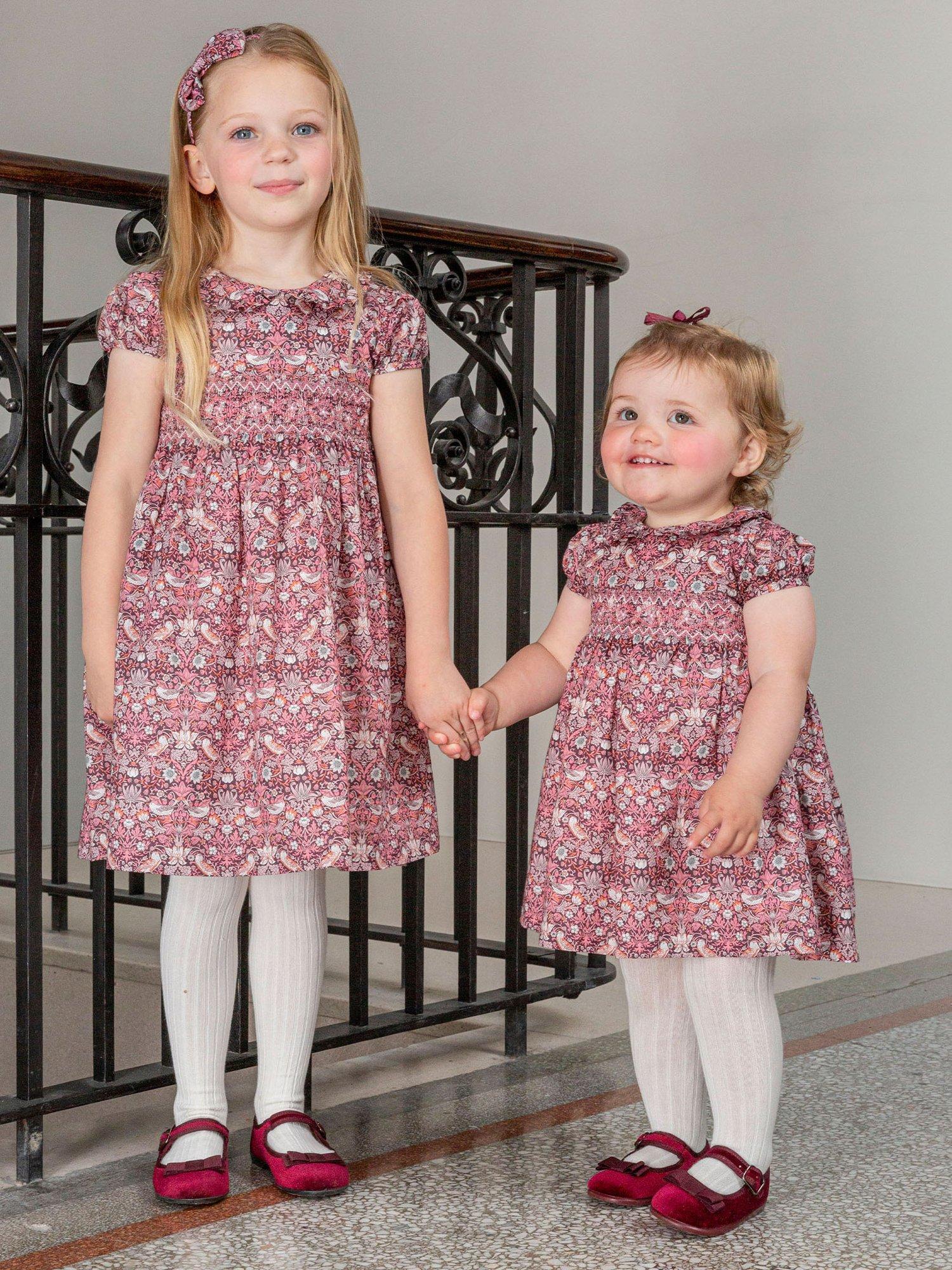 Product image 6 of 6, which shows Trotters Baby Cotton Strawberry Thief Smocked Dress, Multi, 3-6 months