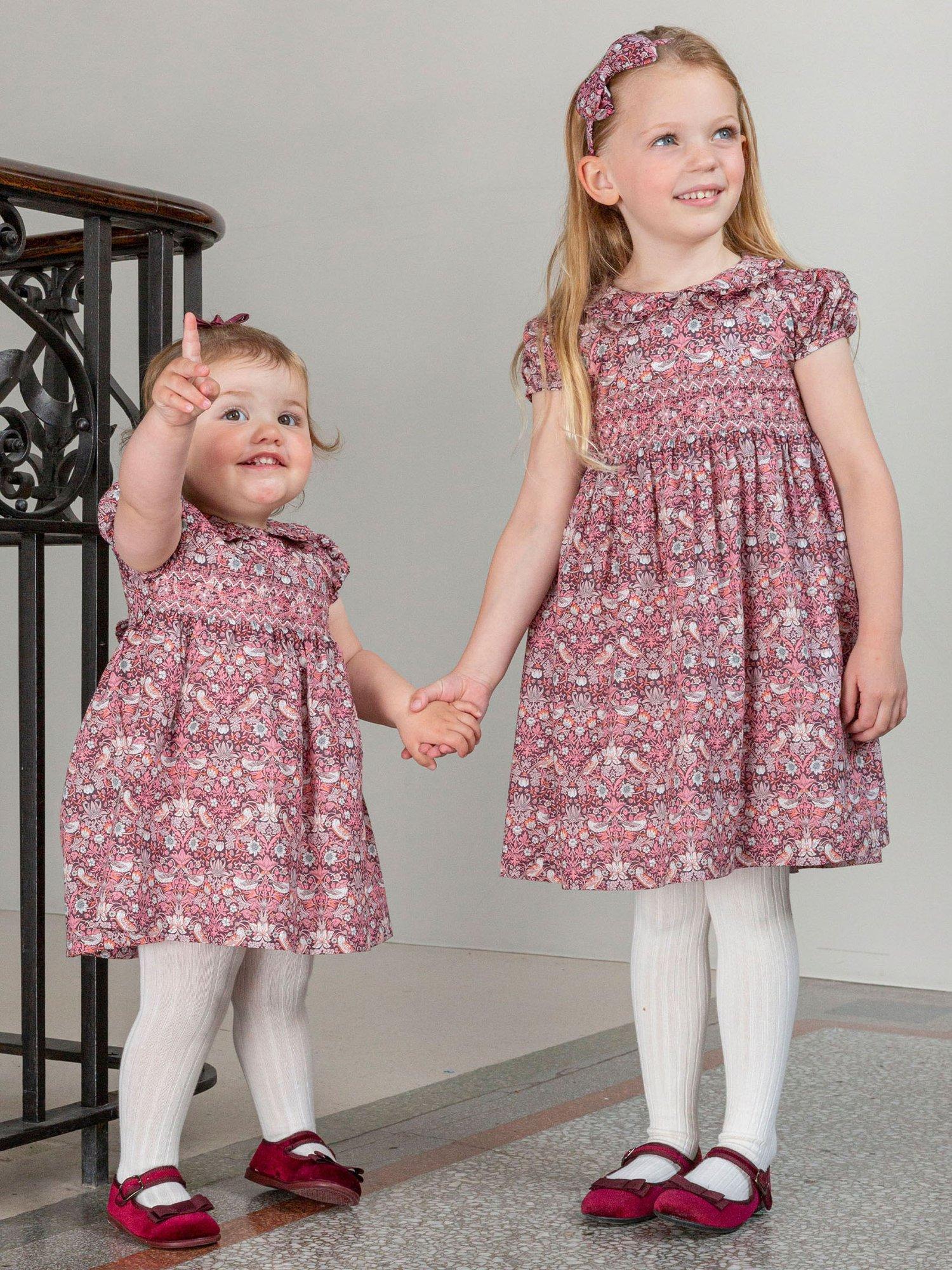 Product image 4 of 6, which shows Trotters Baby Cotton Strawberry Thief Smocked Dress, Multi, 3-6 months