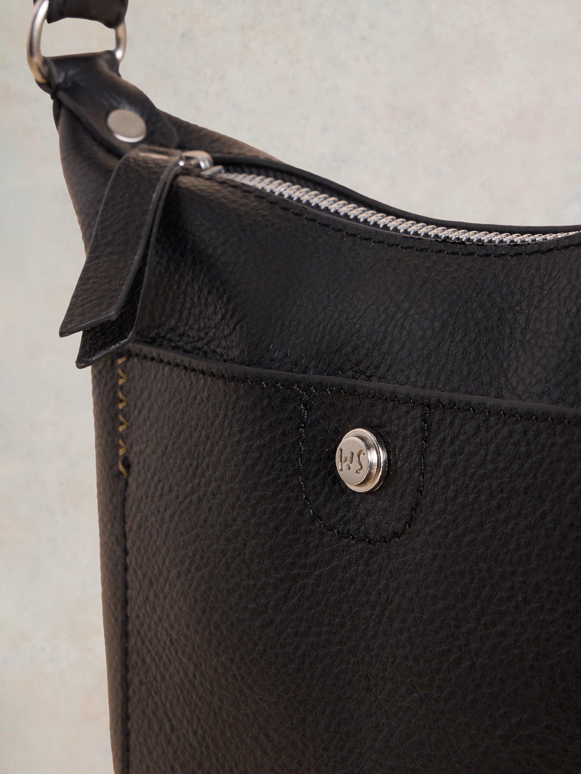 Product image 3 of 5, which shows White Stuff Mini Fern Leather Crossbody Bag, Pure Black