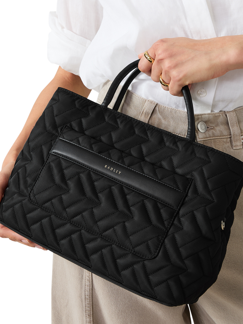 Product image 6 of 6, which shows Radley Holland Park Responsible Quilted Medium Zip Top Grab Bag, Black