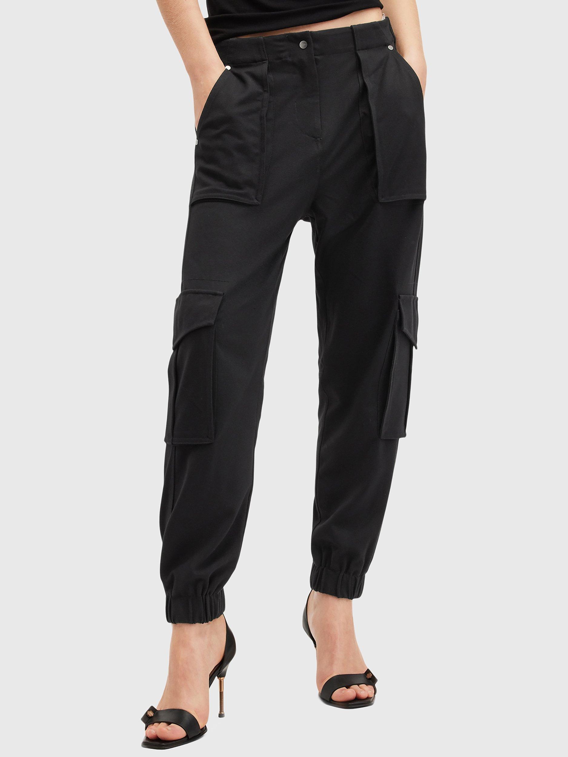 Product image 1 of 8, which shows AllSaints Freda Jersey Trousers, Black, 10