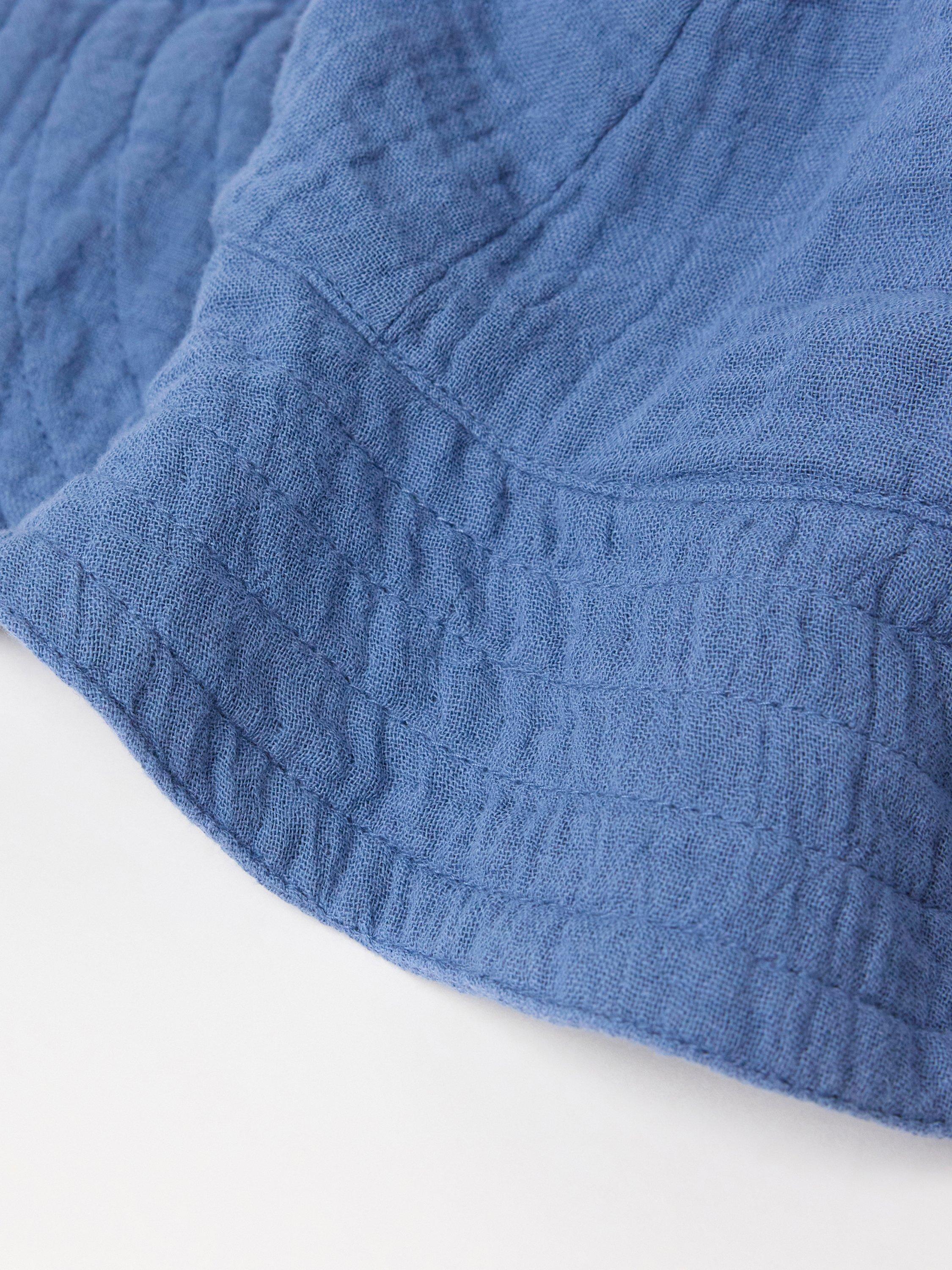 Product image 2 of 3, which shows Lindex Baby Organic Cotton Sun Hat, Dusty Blue, 1-4 months