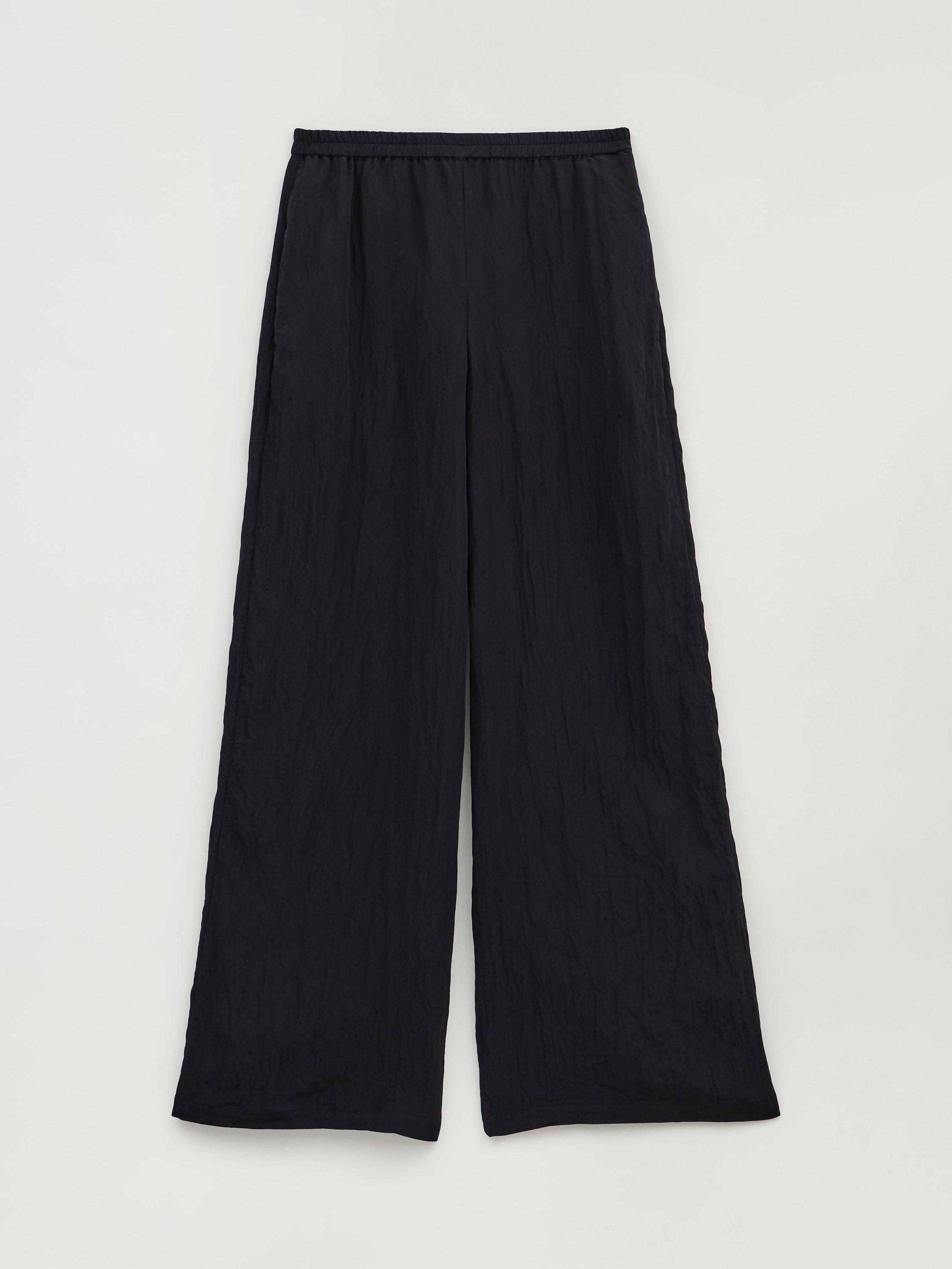 Product image 1 of 4, which shows HUSH Mabel Fluid Wide Leg Trousers, Black, 4R