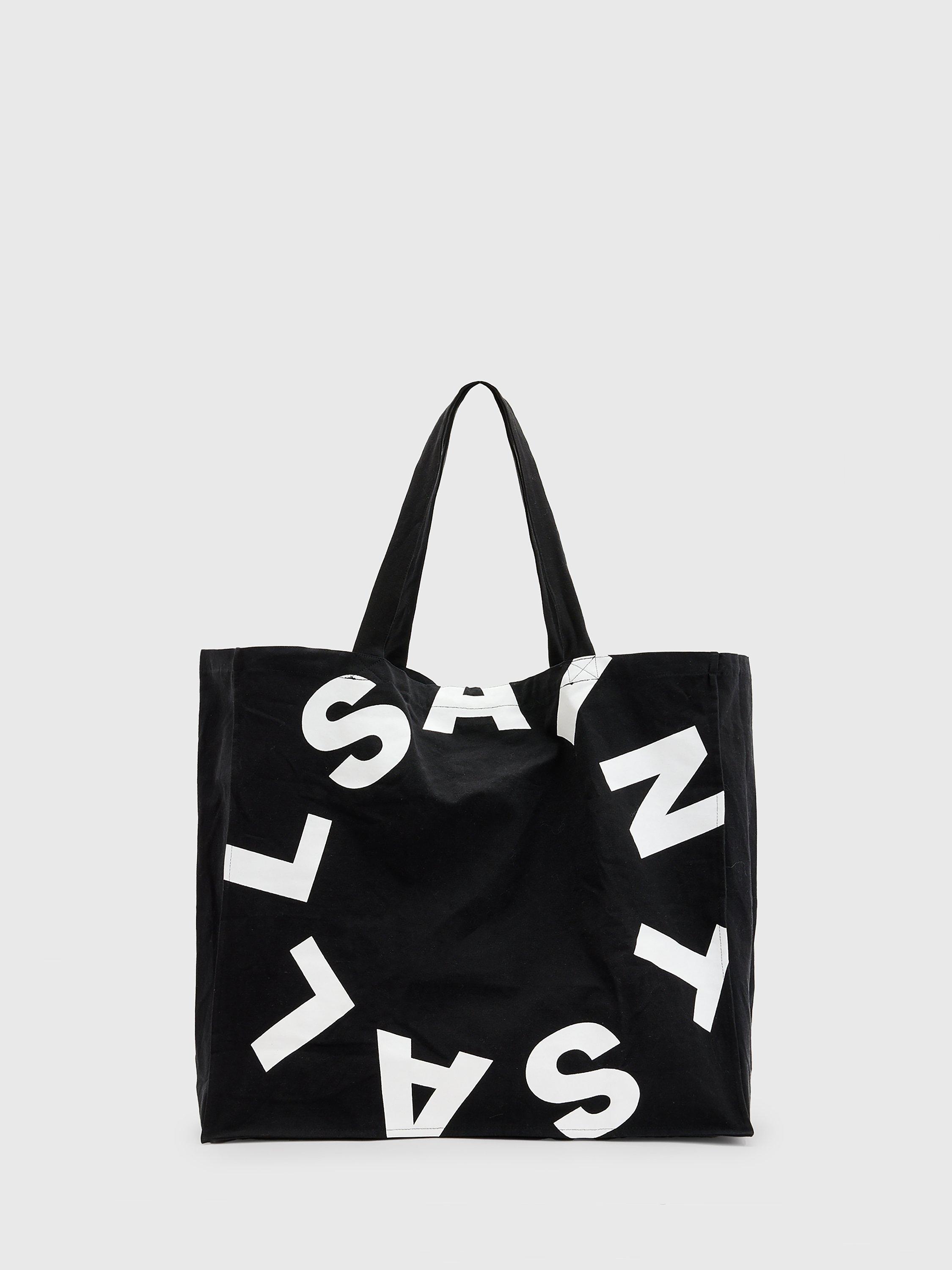Product image 1 of 6, which shows AllSaints Tierra Large Cotton Tote Bag, Black/White, One Size