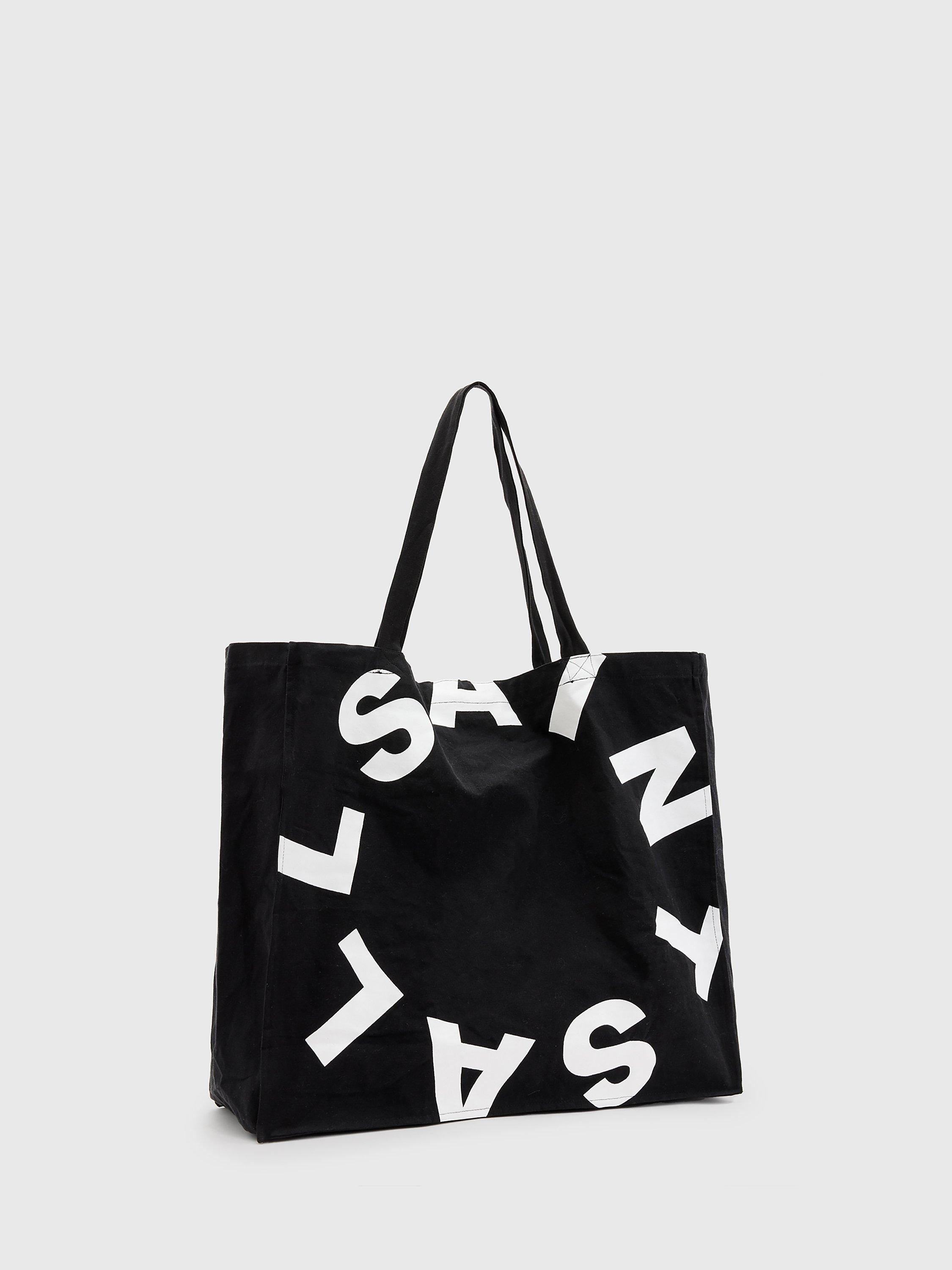 Product image 2 of 6, which shows AllSaints Tierra Large Cotton Tote Bag, Black/White, One Size