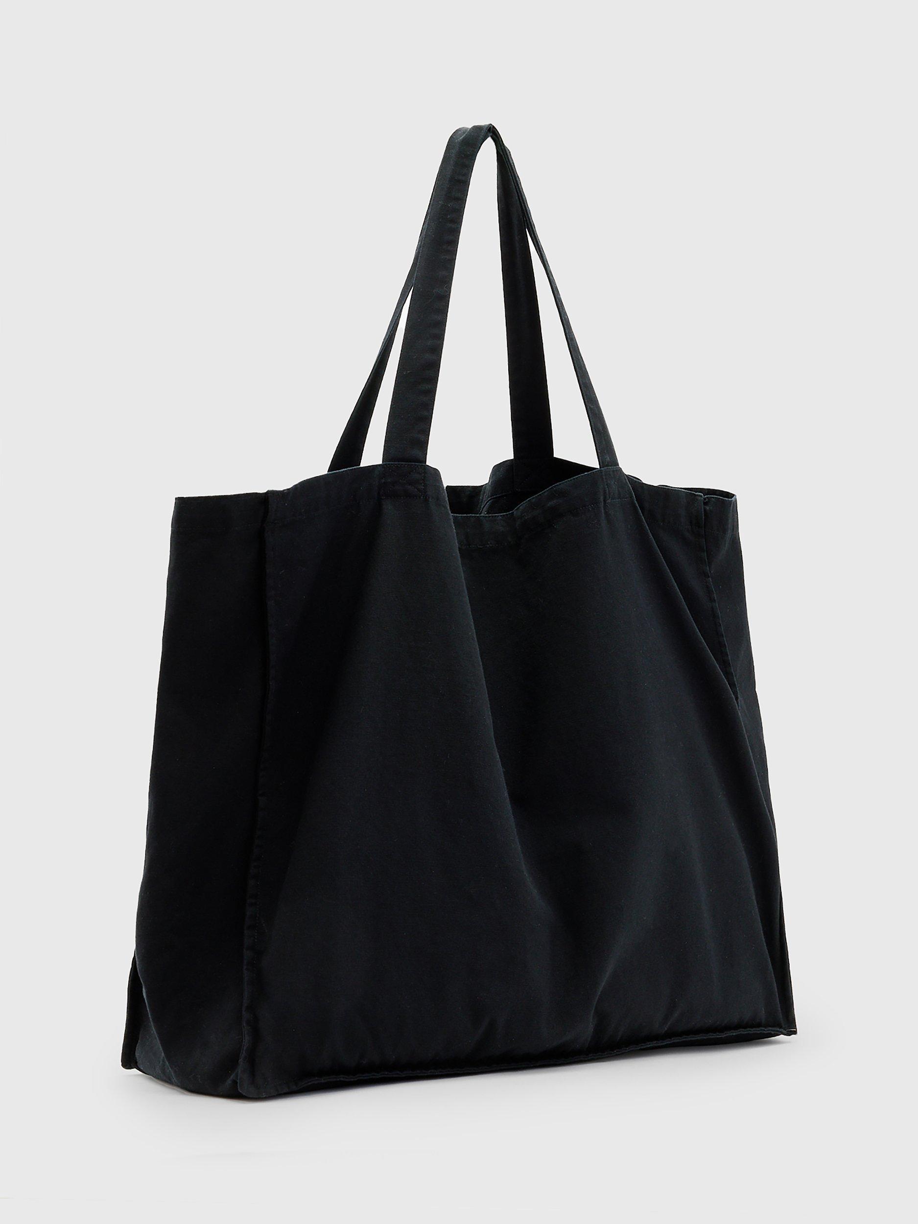 Product image 6 of 6, which shows AllSaints Tierra Large Cotton Tote Bag, Black/White, One Size