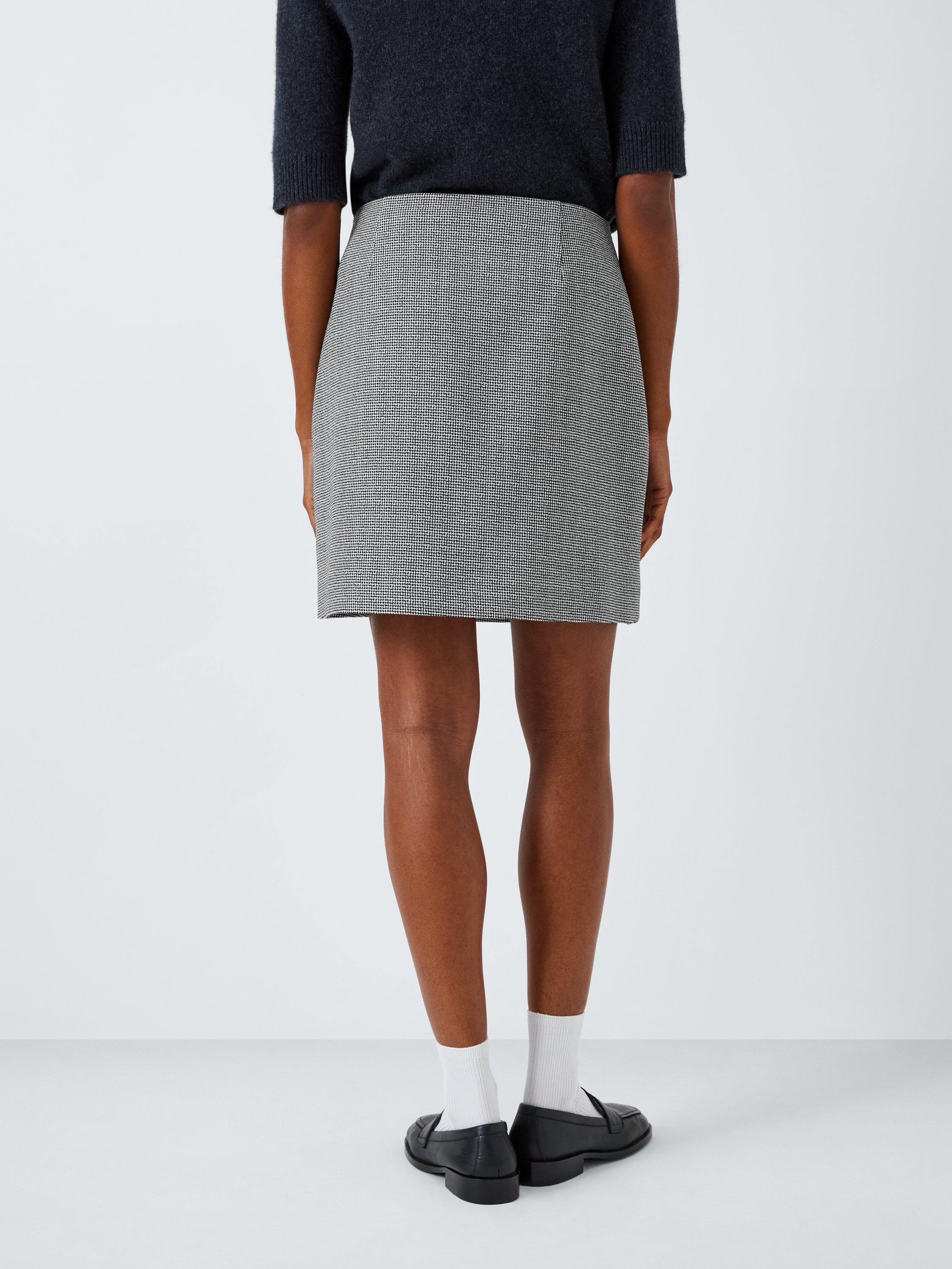 Product image 2 of 6, which shows John Lewis ANYDAY Puppytooth Mini Skirt, White/Black, 20