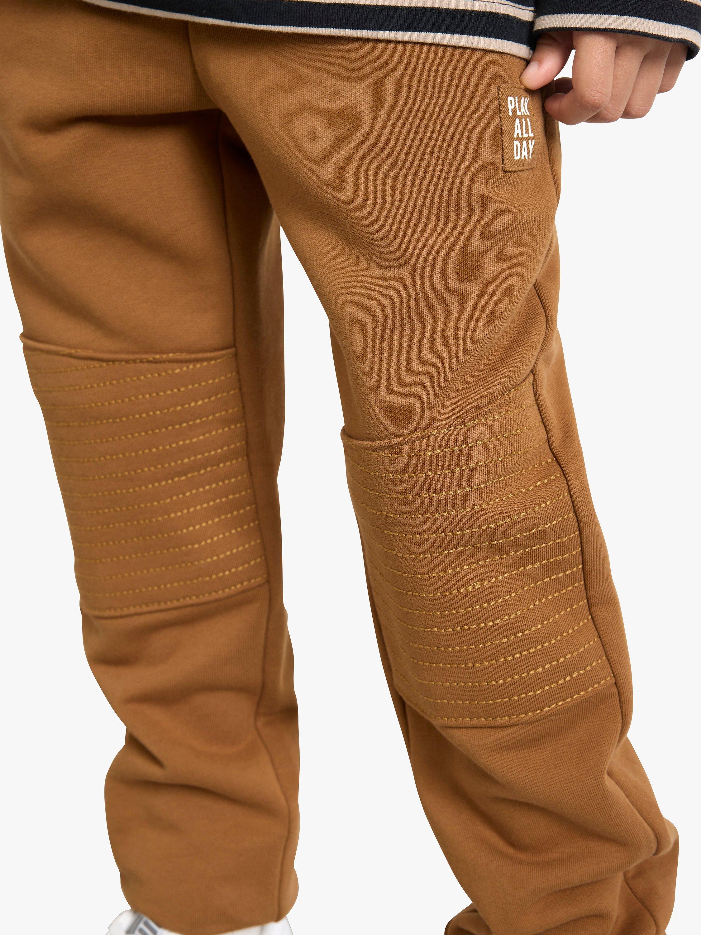 Product image 4 of 7, which shows Lindex Kids' Cotton Tapered Leg Joggers, Light Dusty Brown, 3-4 years