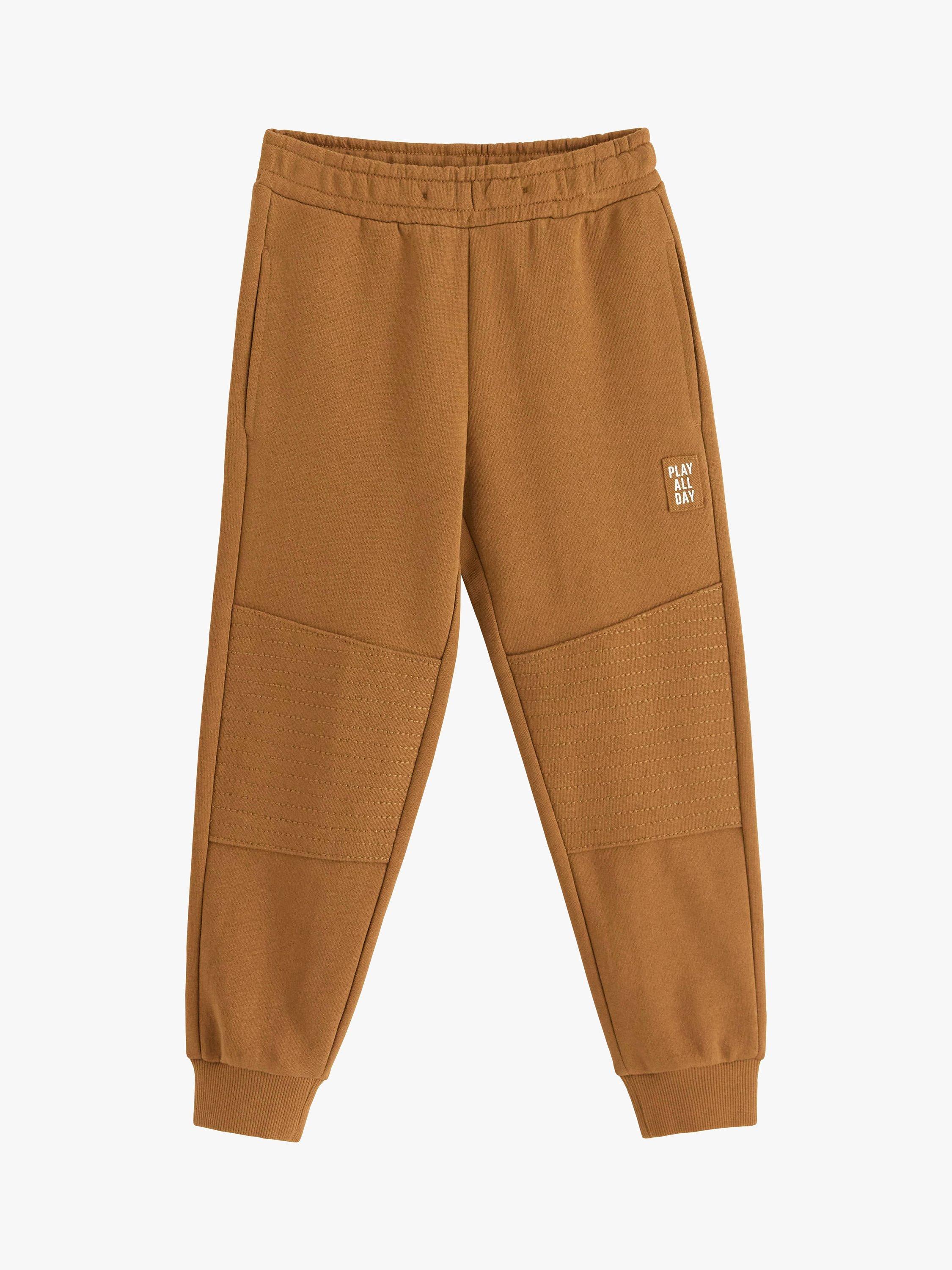Product image 5 of 7, which shows Lindex Kids' Cotton Tapered Leg Joggers, Light Dusty Brown, 3-4 years