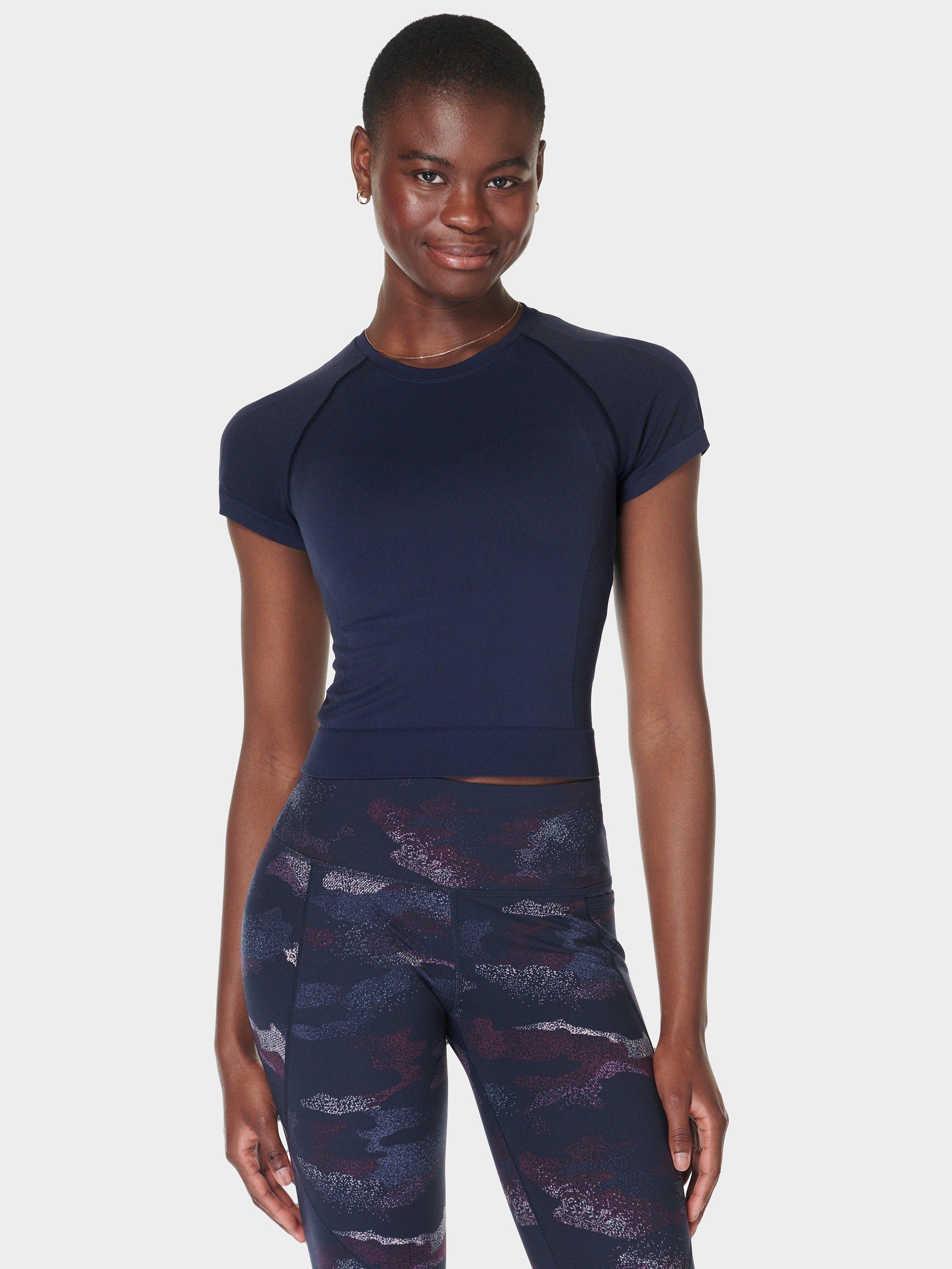 Product image 1 of 6, which shows Sweaty Betty Athlete Crop Seamless Workout Top, Navy Blue, XXS